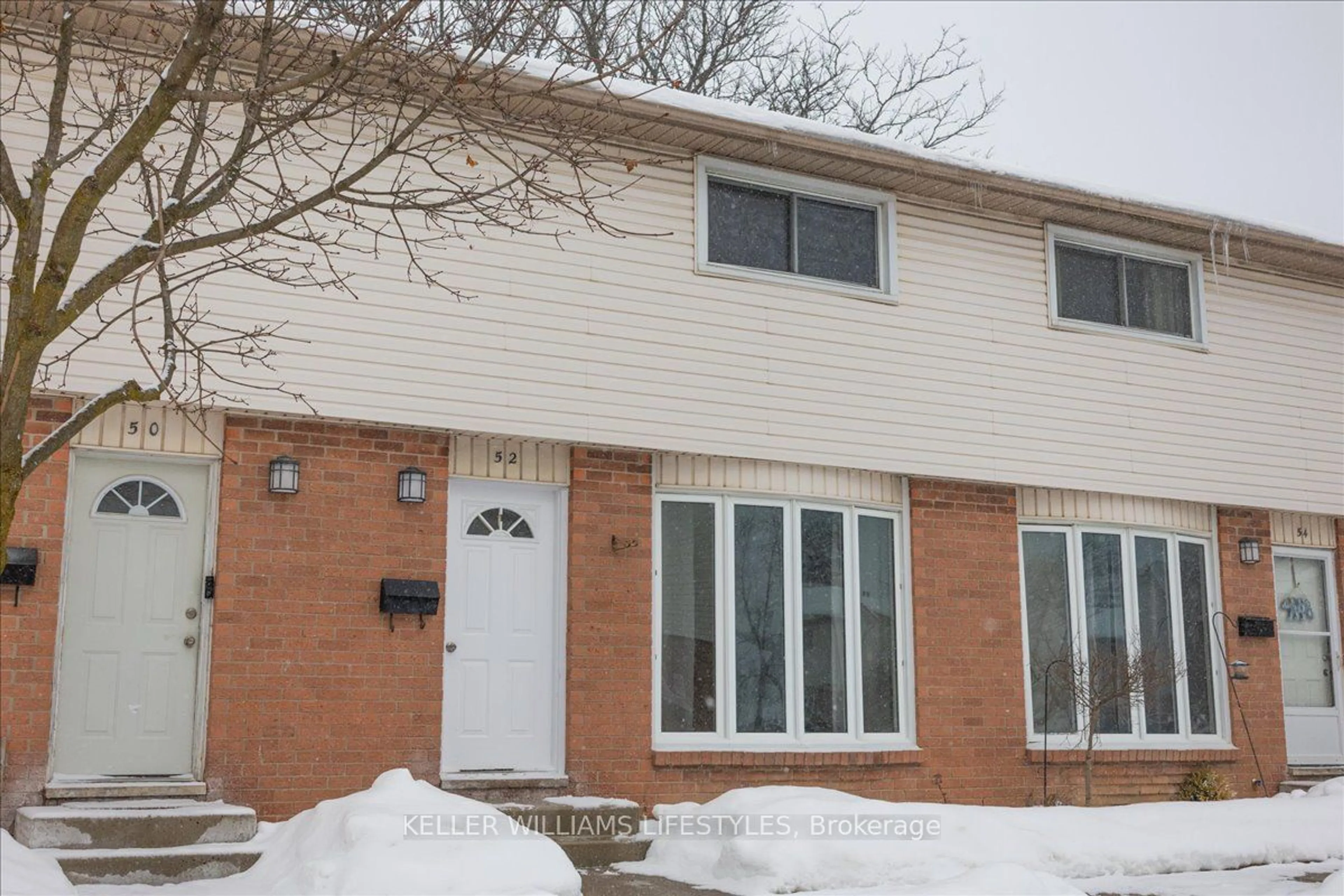 Home with brick exterior material, street for 700 Exeter Rd #52, London Ontario N6E 1L2