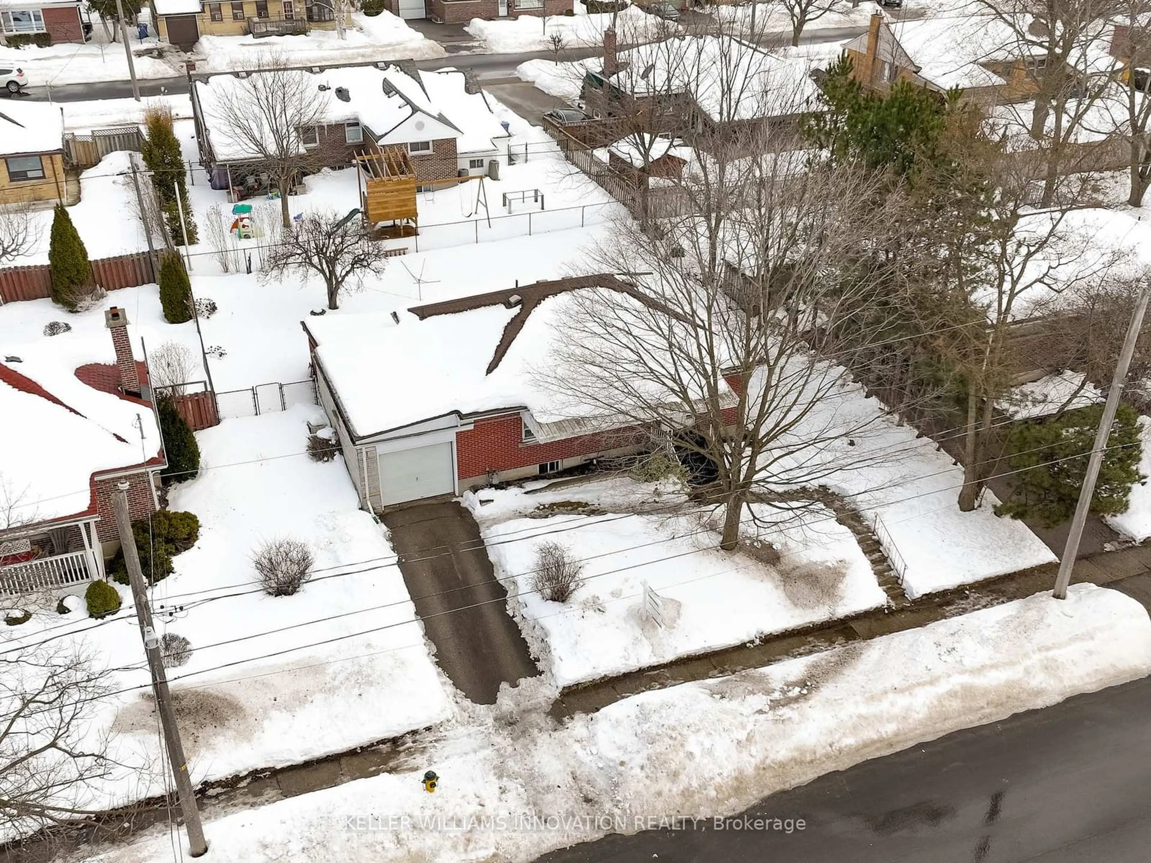 A pic from outside/outdoor area/front of a property/back of a property/a pic from drone, street for 13 Ridgewood Ave, Guelph Ontario N1H 6C3