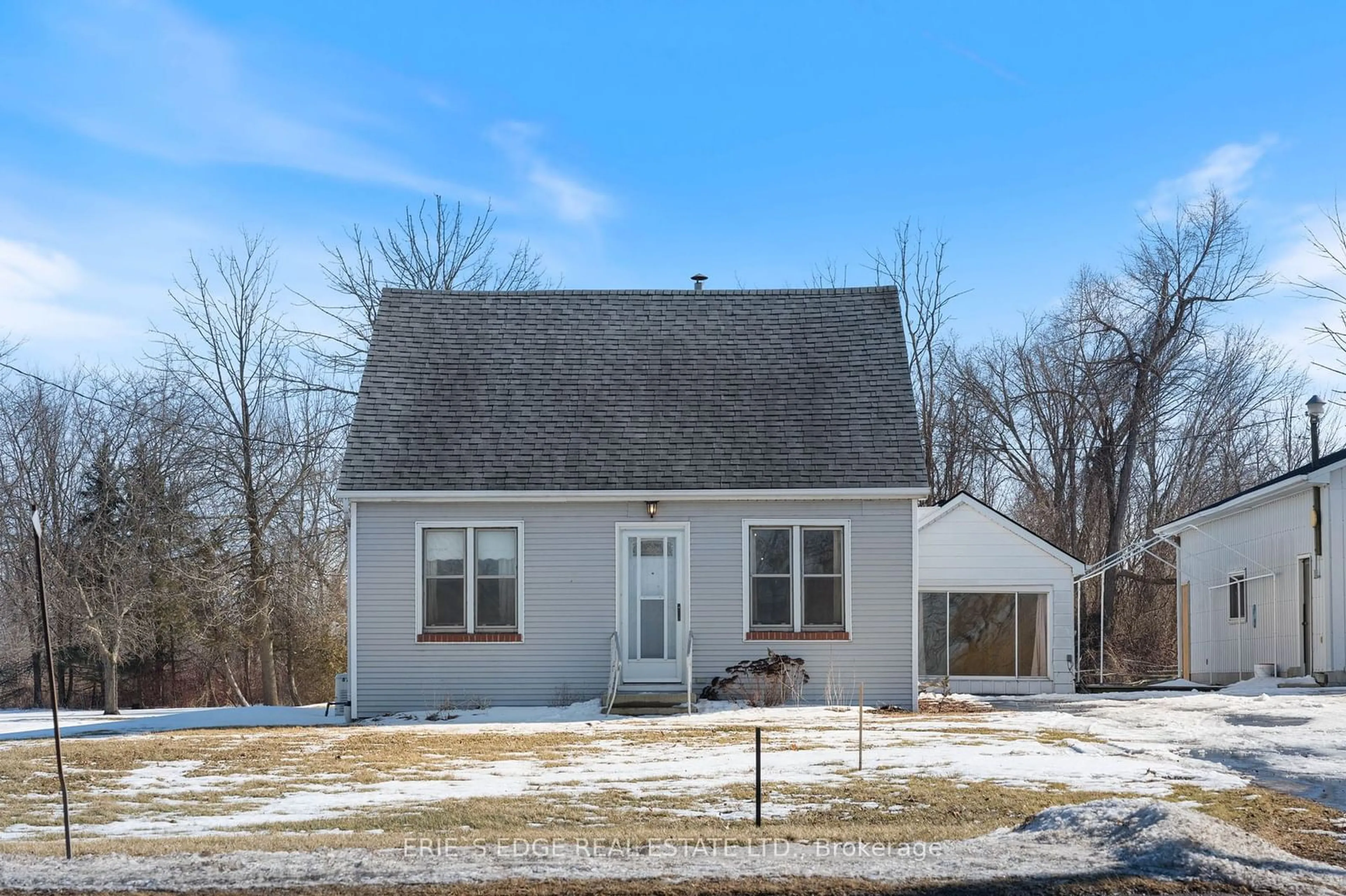 Home with vinyl exterior material, street for 141 Front Rd, Norfolk Ontario N0E 1M0