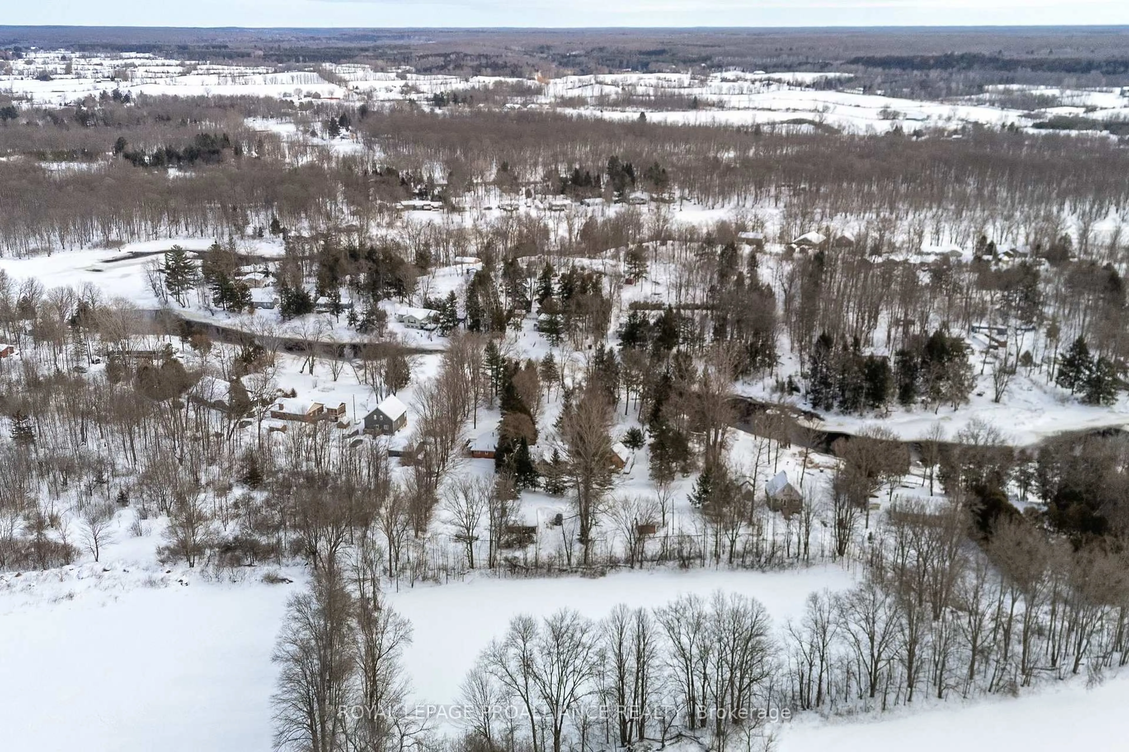 A pic from outside/outdoor area/front of a property/back of a property/a pic from drone, forest/trees view for 122 SUNSMILE Lane, Tweed Ontario K0K 3J0