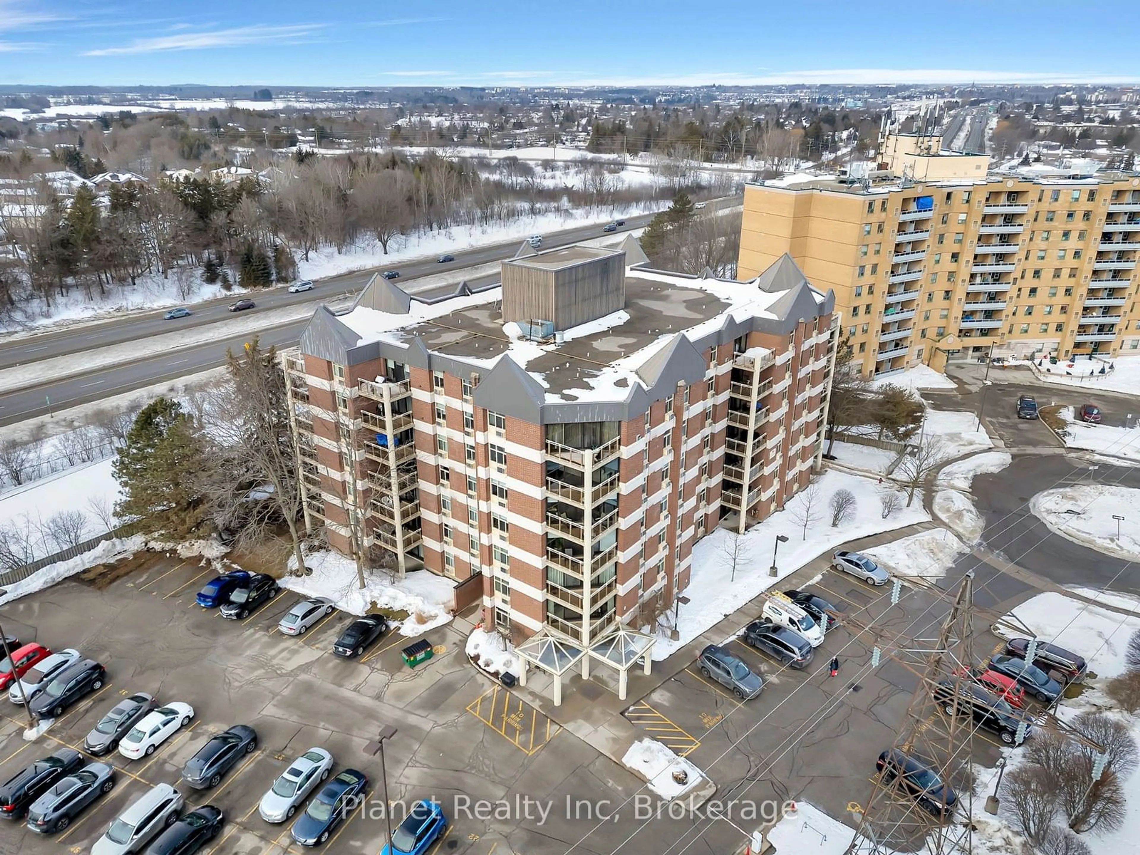 A pic from outside/outdoor area/front of a property/back of a property/a pic from drone, city buildings view from balcony for 8 Christopher Crt #102, Guelph Ontario N1G 4N7