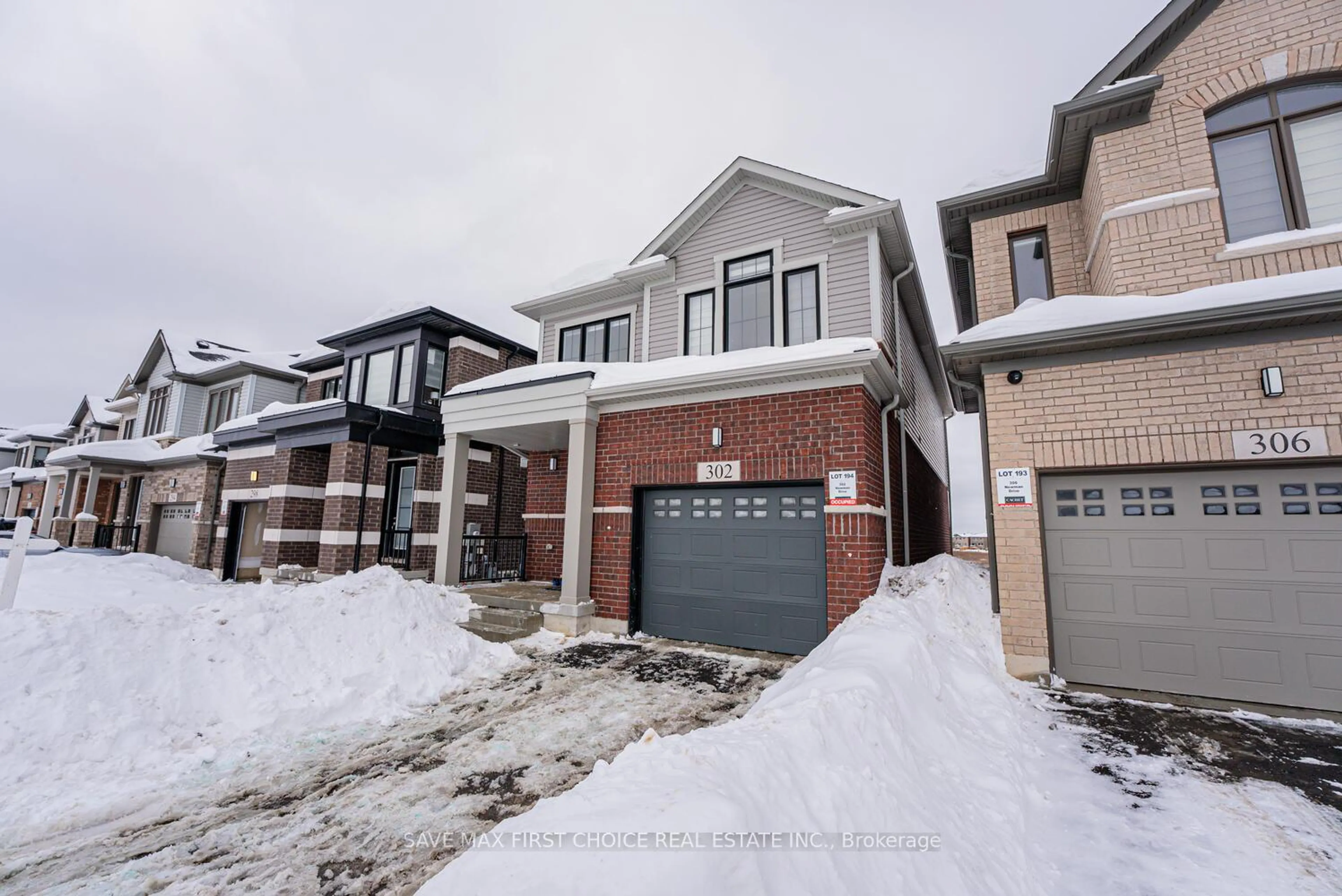 Home with brick exterior material, street for 302 Newman Dr, Cambridge Ontario N1S 0E1