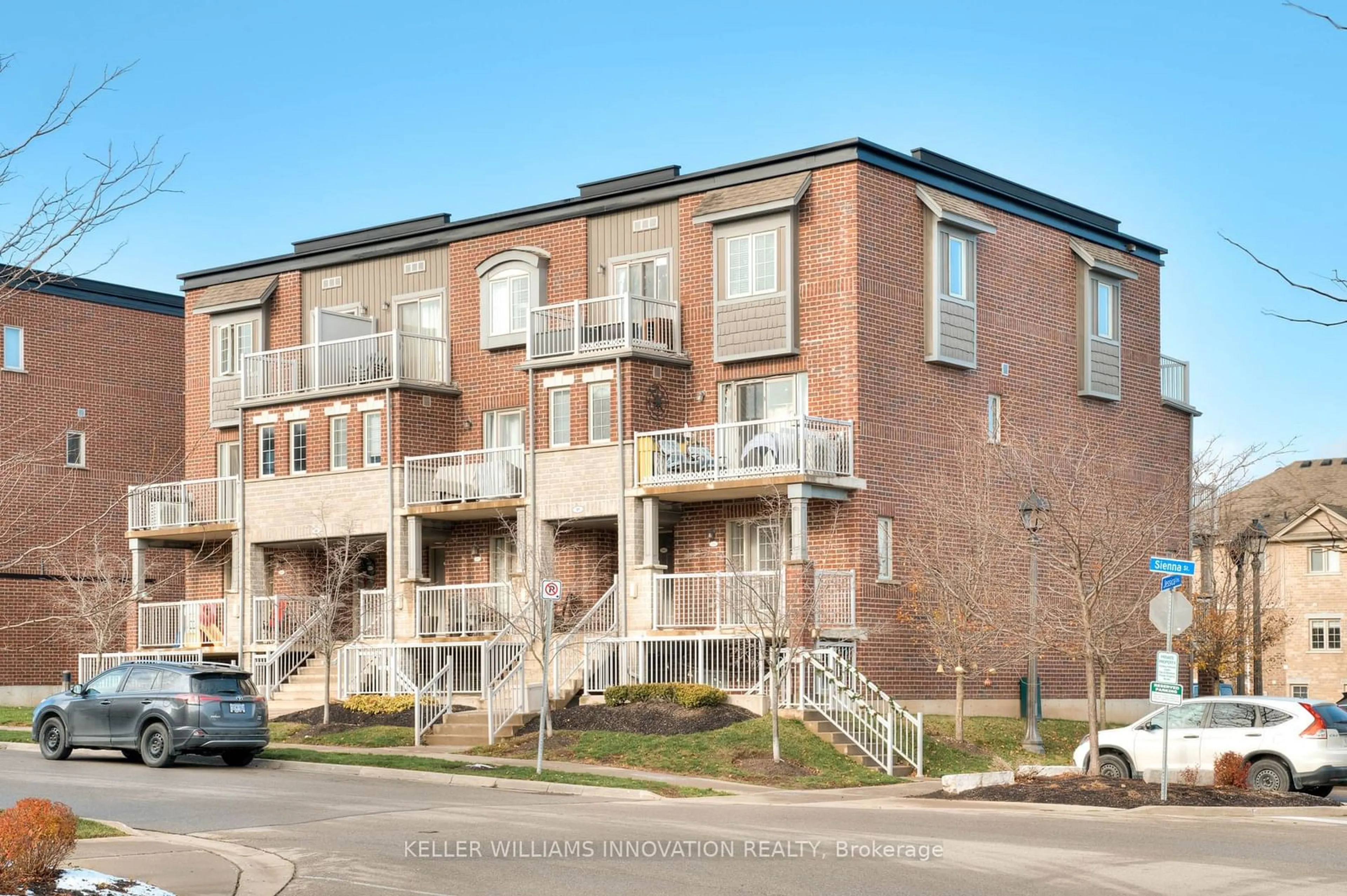 Home with brick exterior material, street for 29 Sienna St #H, Kitchener Ontario N2R 0H8