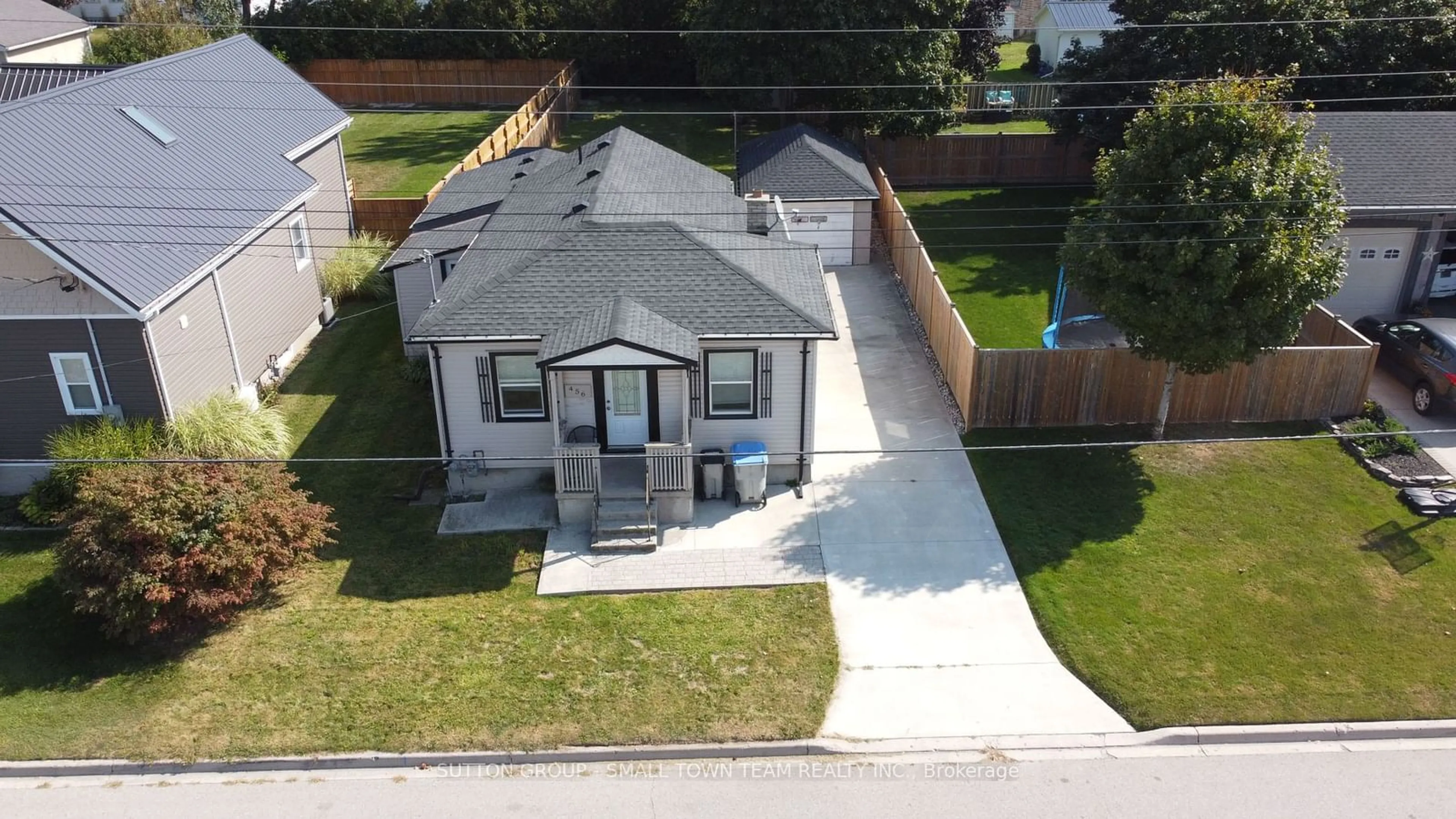 A pic from outside/outdoor area/front of a property/back of a property/a pic from drone, street for 456 Andrew St, South Huron Ontario N0M 1S1