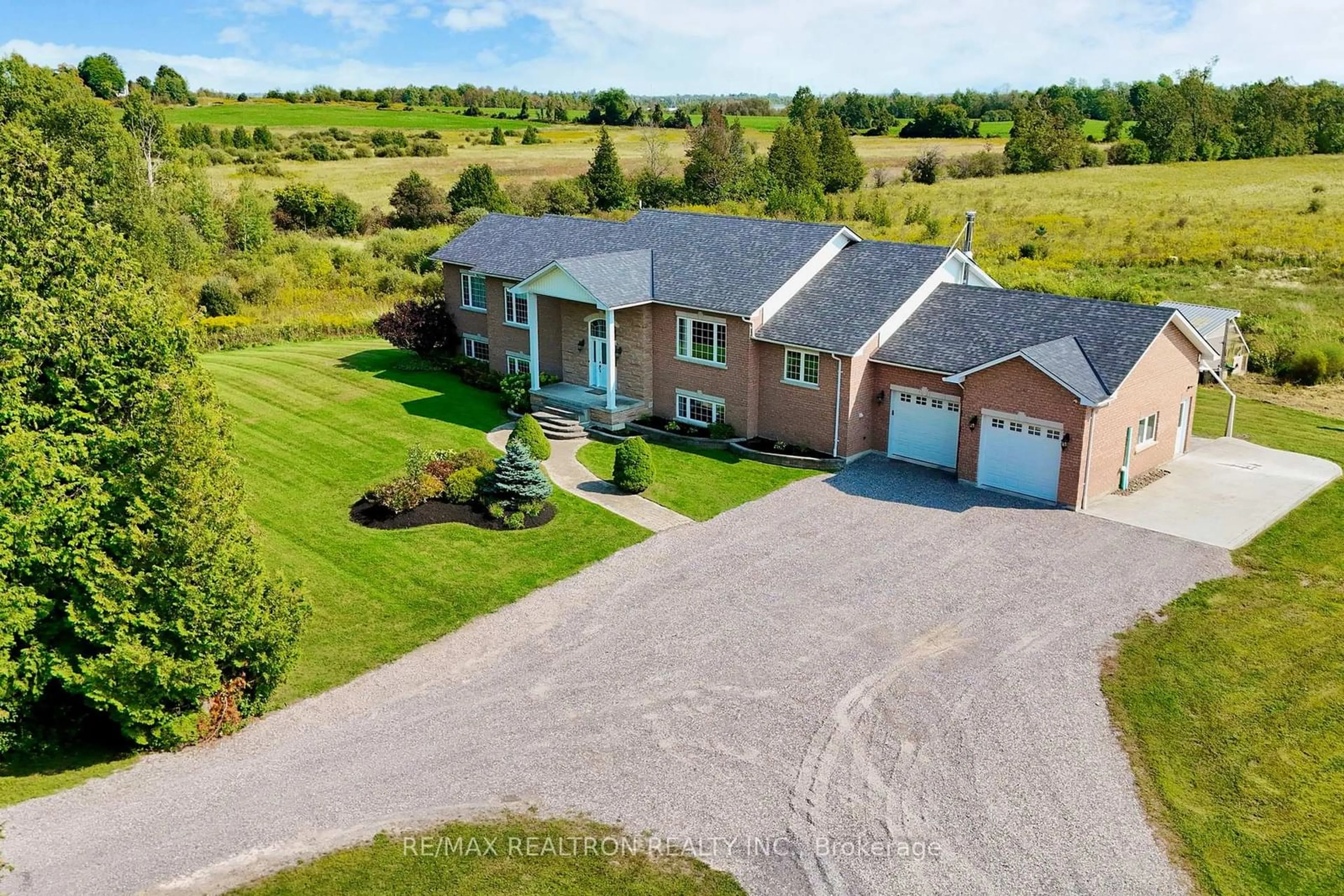 A pic from outside/outdoor area/front of a property/back of a property/a pic from drone, water/lake/river/ocean view for 1599 Moore Dr, Cavan Monaghan Ontario L0A 1C0