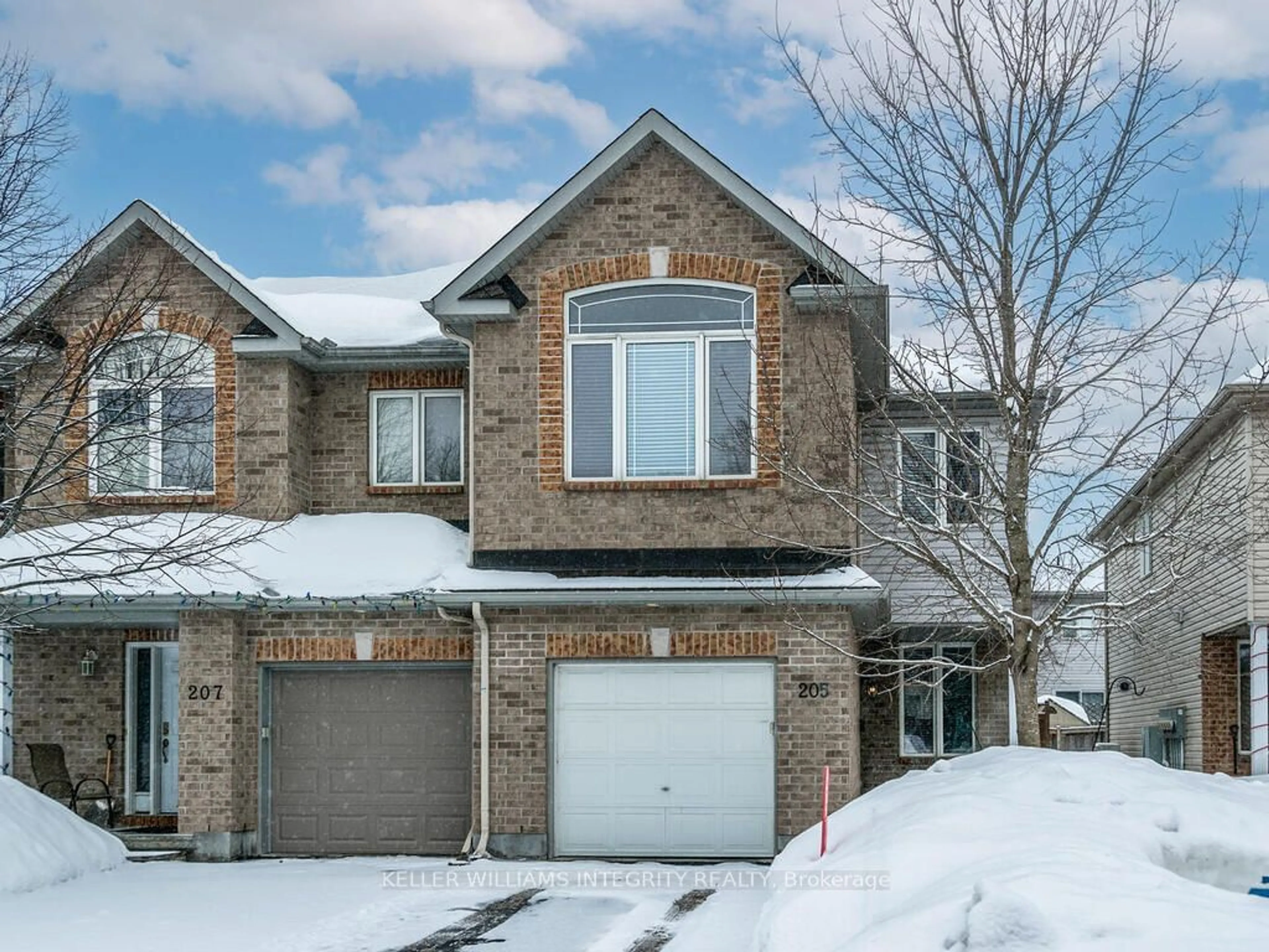 Home with brick exterior material, street for 205 Talltree Cres, Stittsville - Munster - Richmond Ontario K2S 0A9