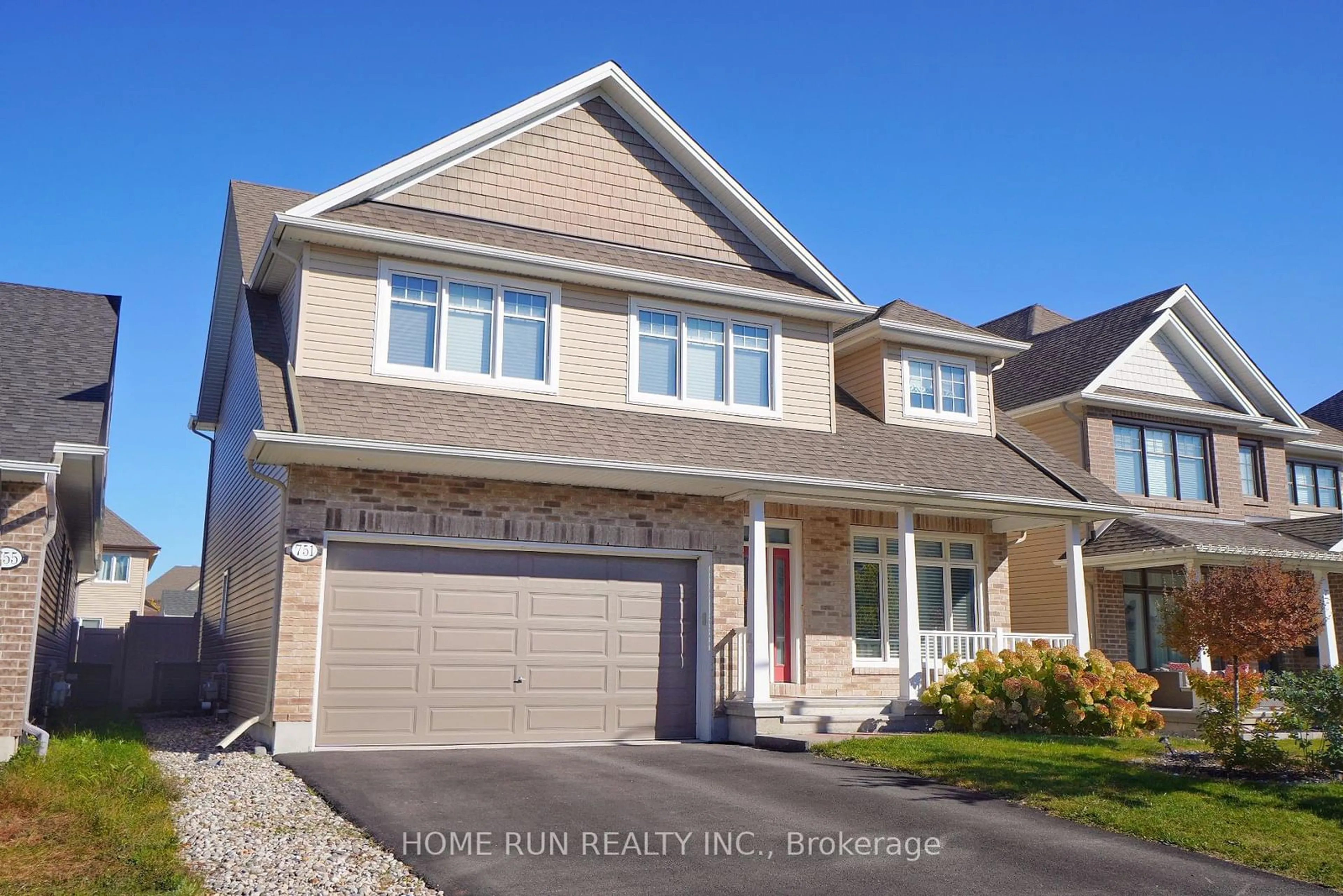 Home with vinyl exterior material, street for 751 BUNCHBERRY Way, Blossom Park - Airport and Area Ontario K1T 0J8