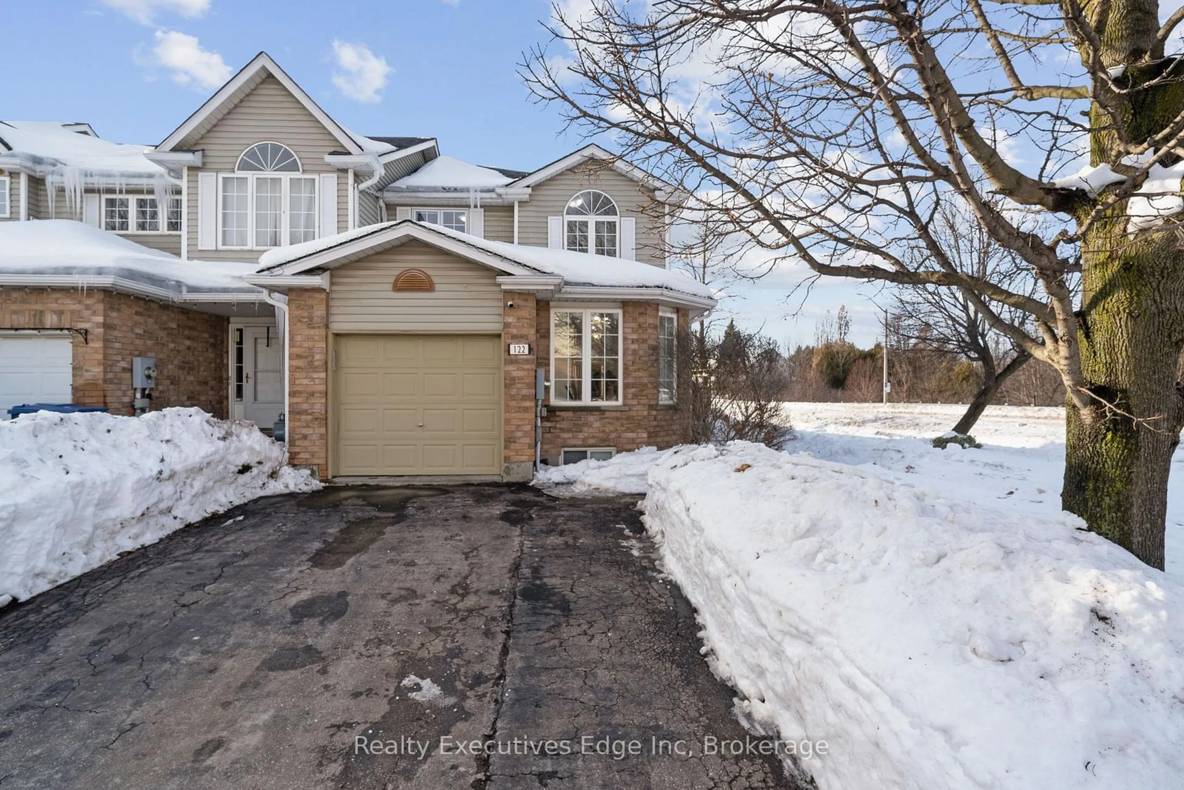 A pic from outside/outdoor area/front of a property/back of a property/a pic from drone, street for 122 Chesterton Lane, Guelph Ontario N1E 7B8