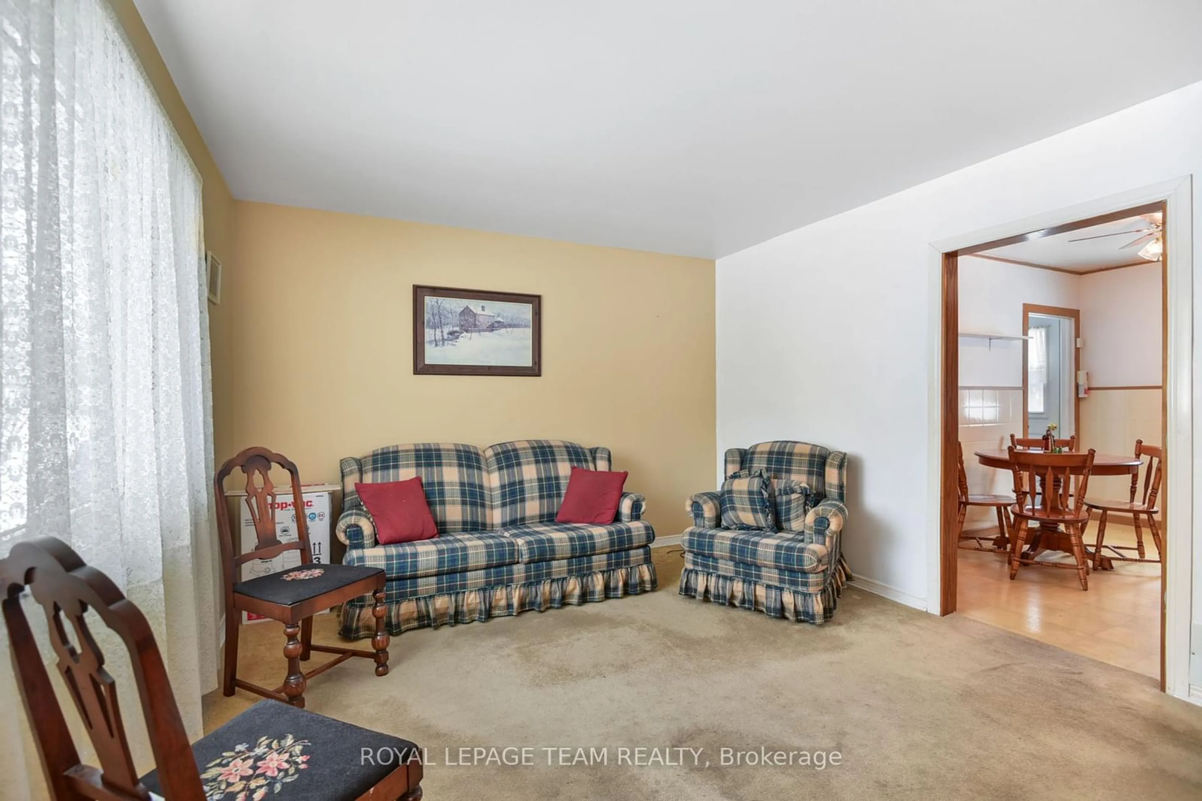 Living room with furniture, carpet floor for 588 Churchill Rd, Prescott Ontario K0E 1T0