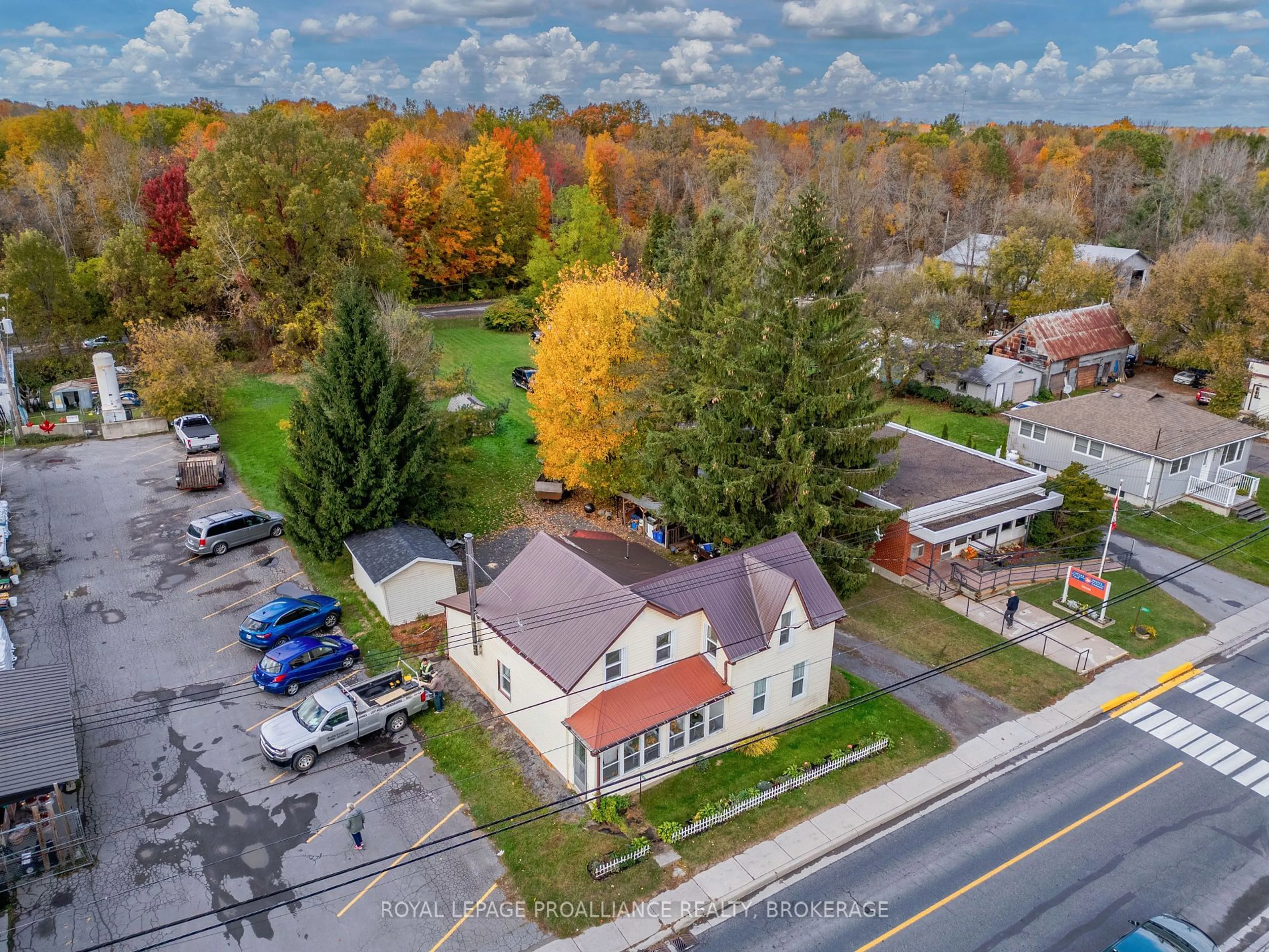 A pic from outside/outdoor area/front of a property/back of a property/a pic from drone, street for 6745 HIGHWAY 38, South Frontenac Ontario K0H 2W0