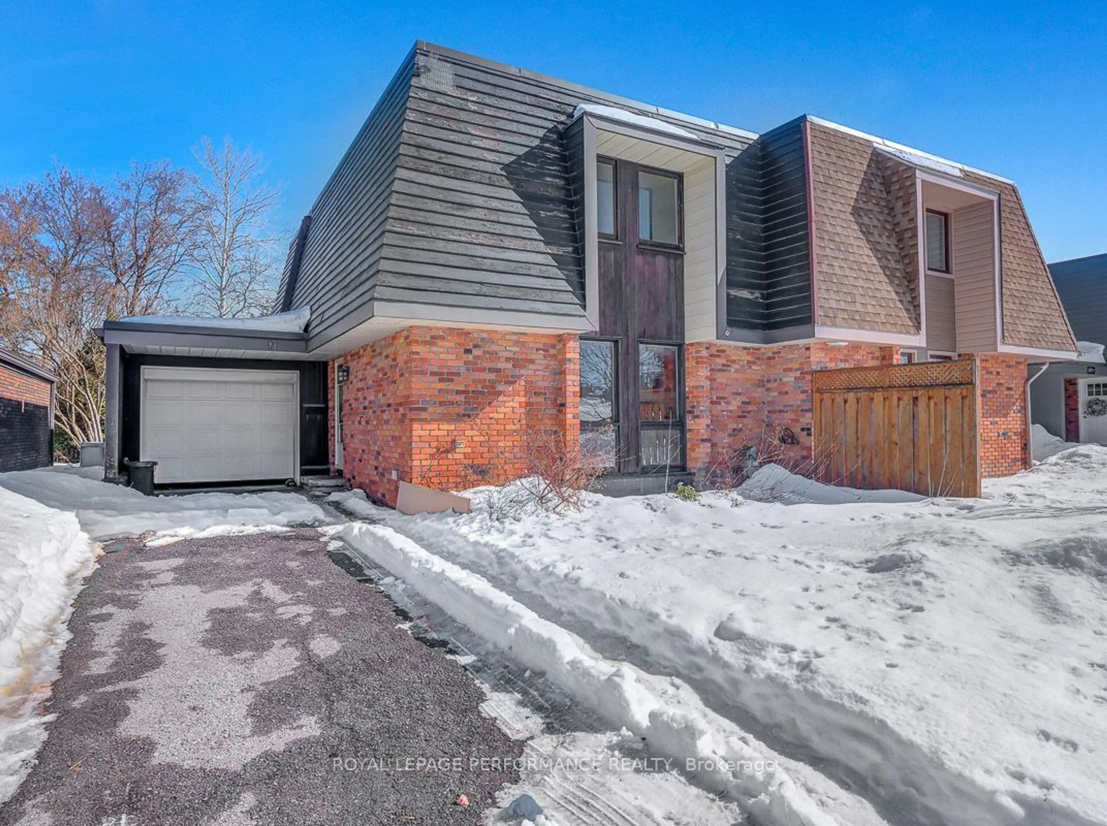 Home with brick exterior material, street for 91 Penfield Dr, Kanata Ontario K2K 1L9