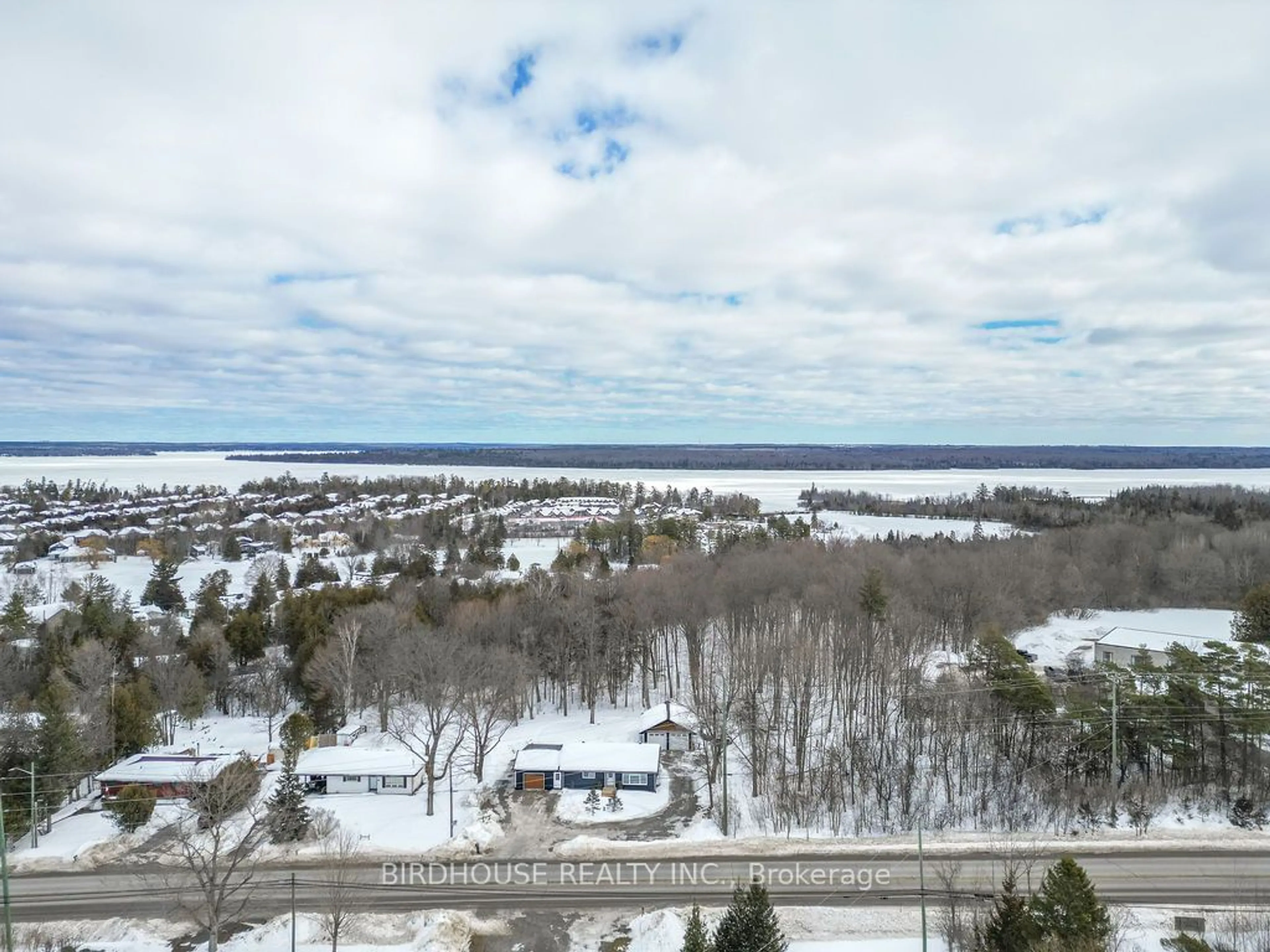 A pic from outside/outdoor area/front of a property/back of a property/a pic from drone, water/lake/river/ocean view for 294 East St, Kawartha Lakes Ontario K0M 1A0