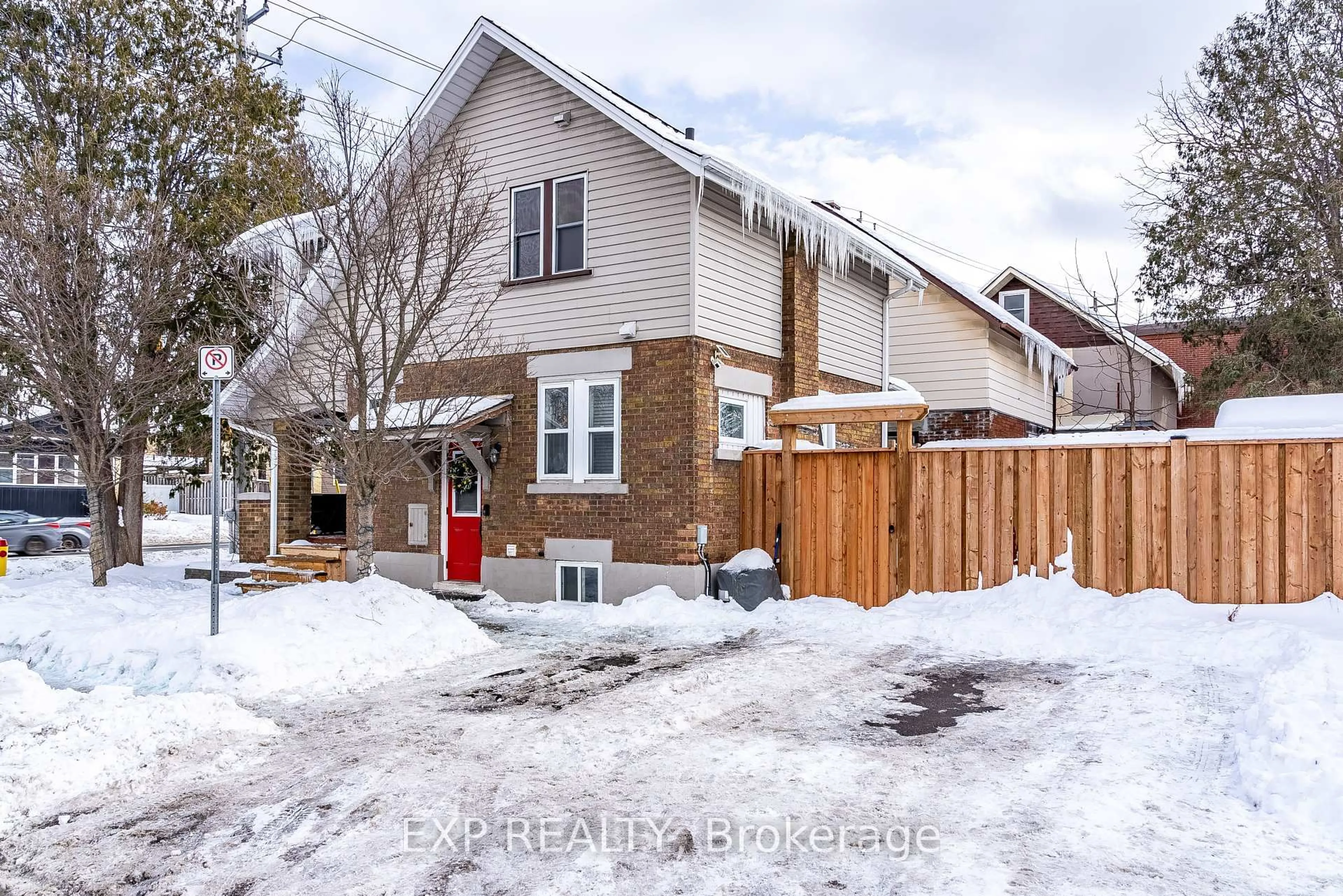 Home with brick exterior material, street for 63 Lancaster St, Kitchener Ontario N2H 4T1