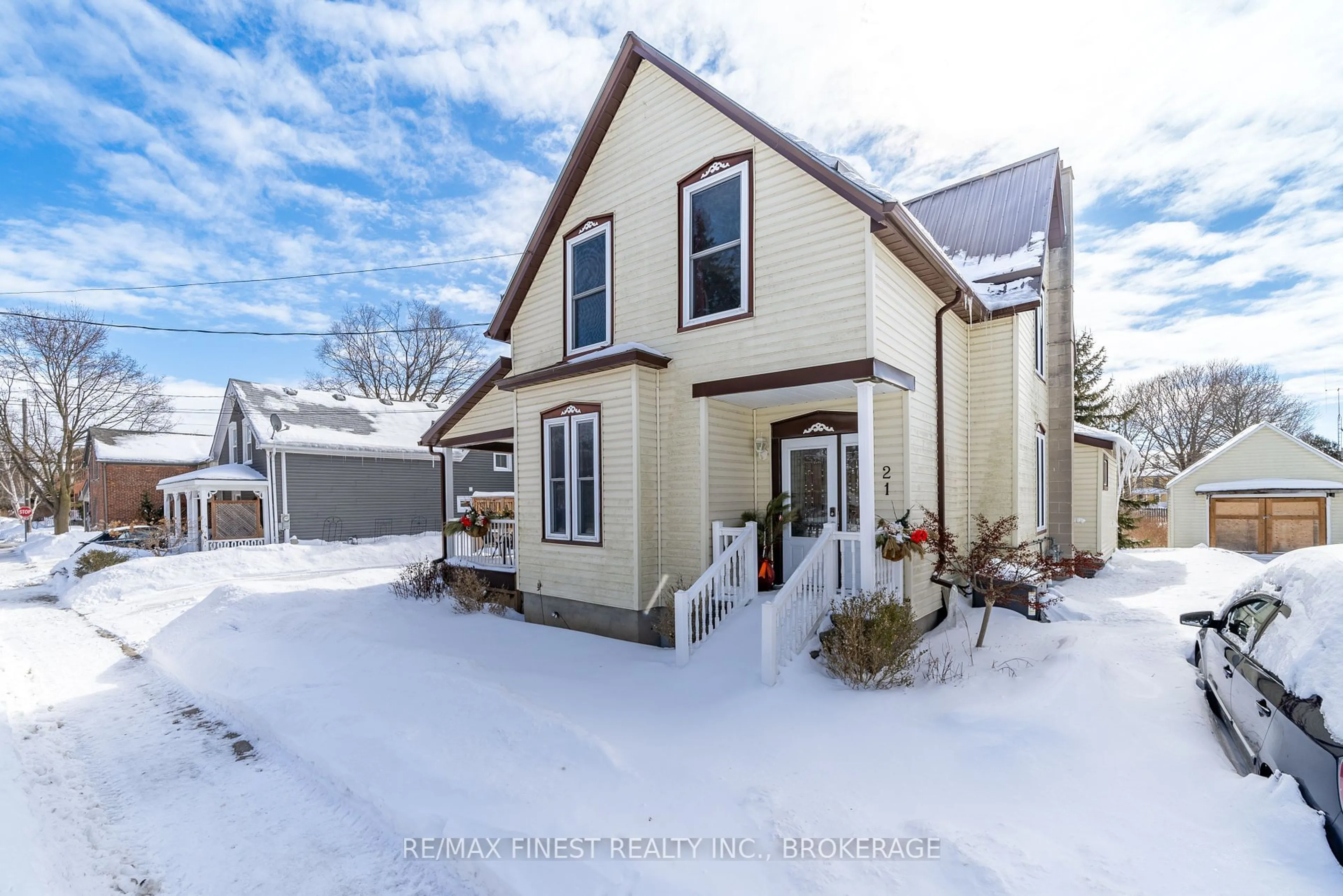 A pic from outside/outdoor area/front of a property/back of a property/a pic from drone, street for 21 Centre St, Prince Edward County Ontario K0K 2T0