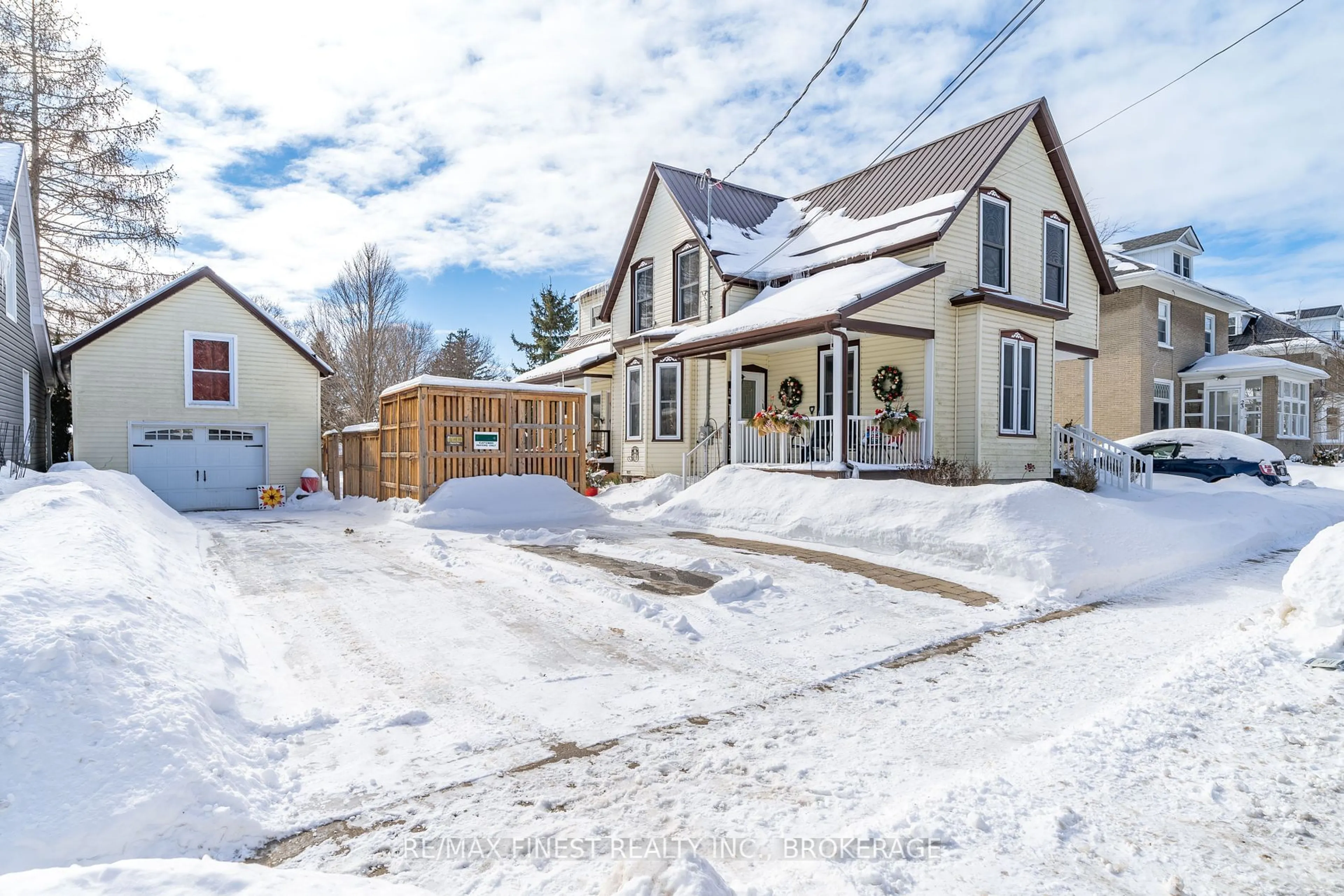 A pic from outside/outdoor area/front of a property/back of a property/a pic from drone, street for 21 Centre St, Prince Edward County Ontario K0K 2T0