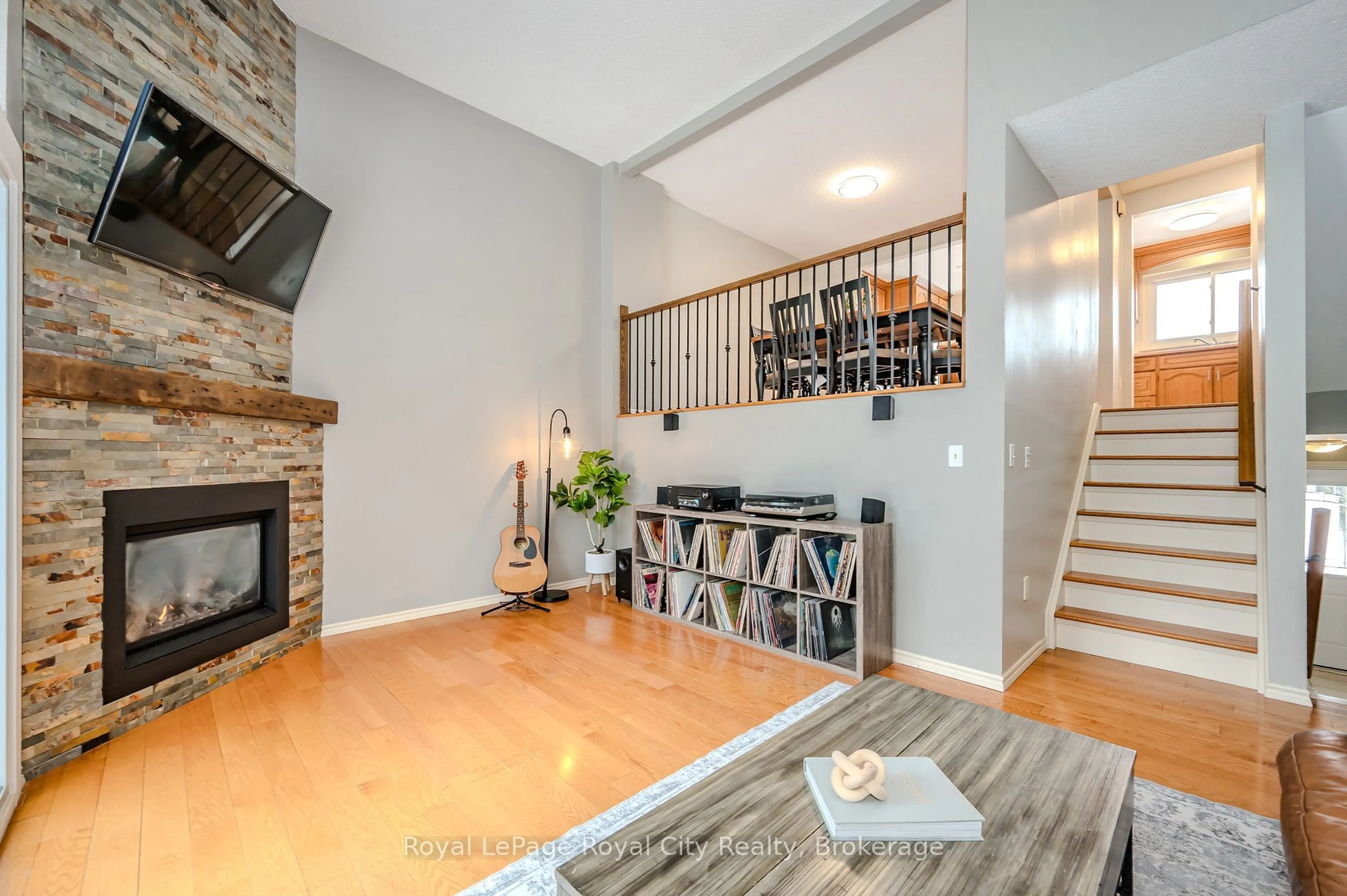 Living room with furniture, wood/laminate floor for 2 Worton Ave #9, Guelph Ontario N1H 7C5