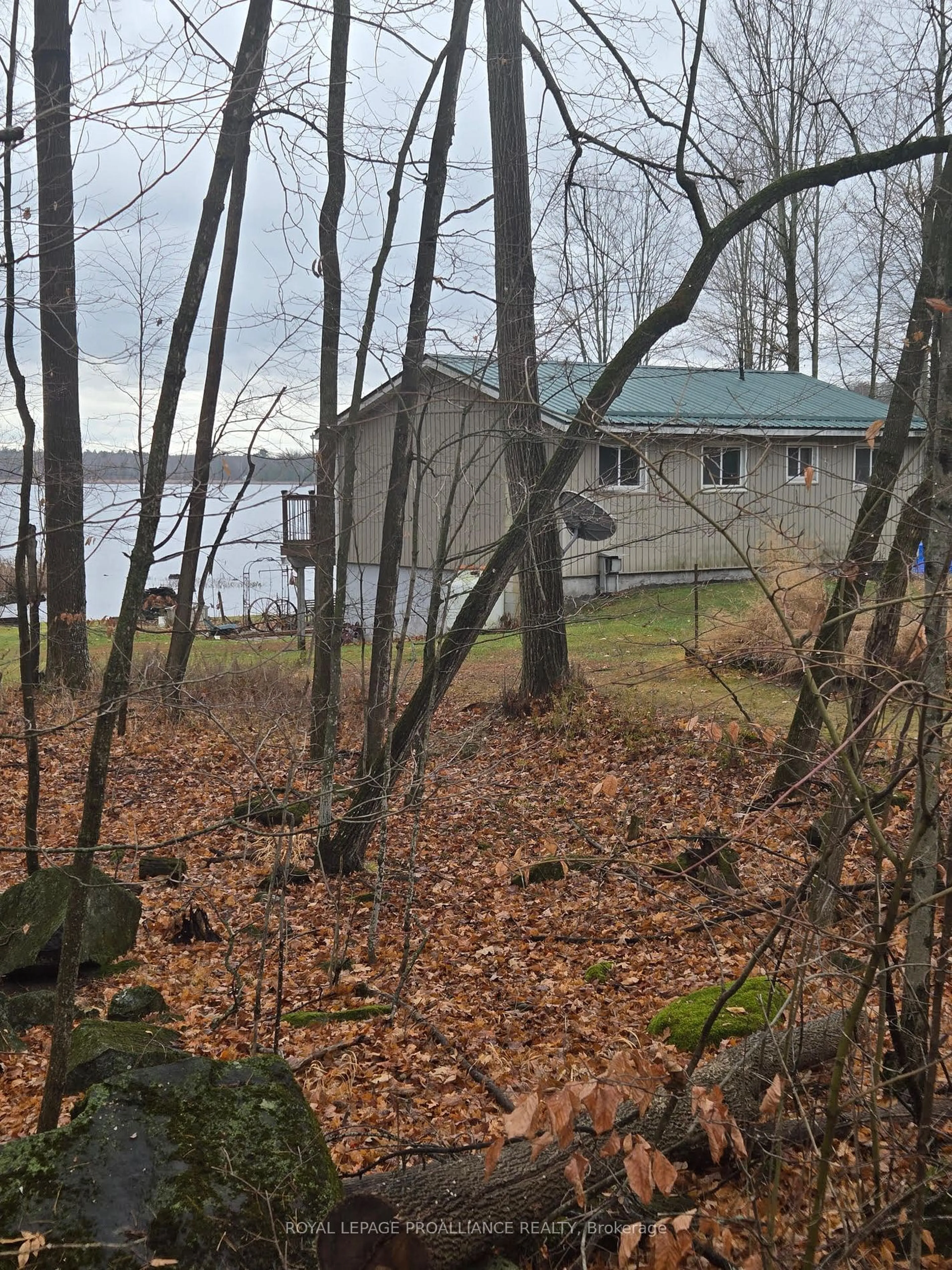 A pic from outside/outdoor area/front of a property/back of a property/a pic from drone, water/lake/river/ocean view for 1081 Cook Rd, Marmora and Lake Ontario K0K 2M0