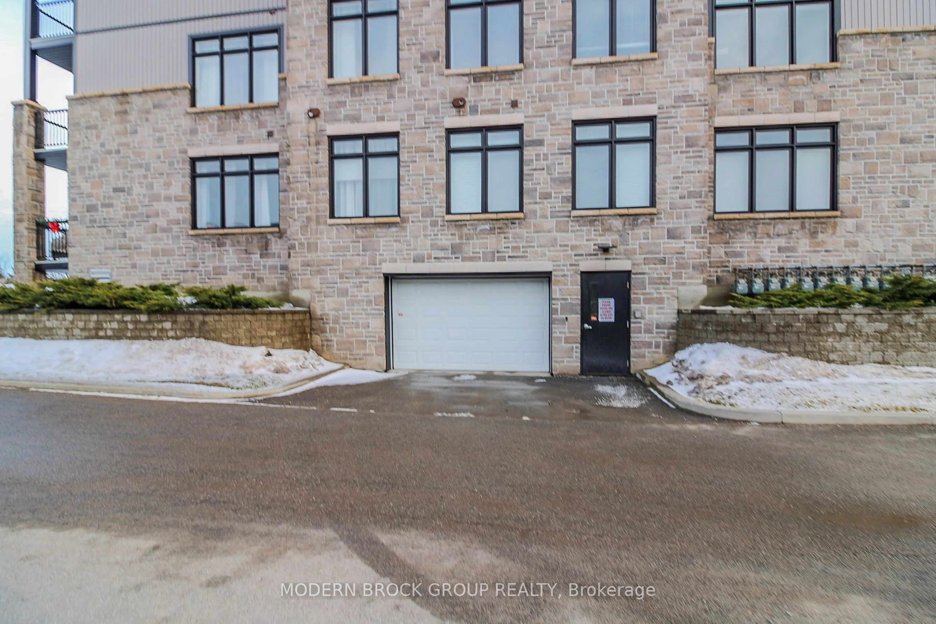 A pic from outside/outdoor area/front of a property/back of a property/a pic from drone, street for 1109 Millwood Ave #103, Brockville Ontario K6V 0C7