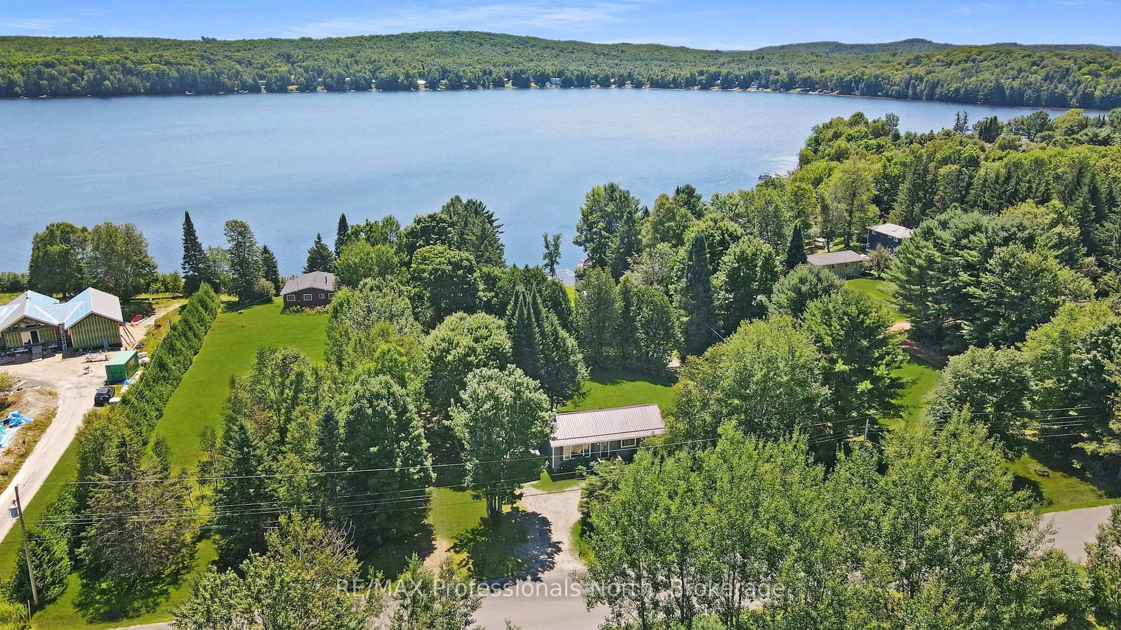 A pic from outside/outdoor area/front of a property/back of a property/a pic from drone, water/lake/river/ocean view for 1358 North Shore Rd, Algonquin Highlands Ontario K0M 1S0