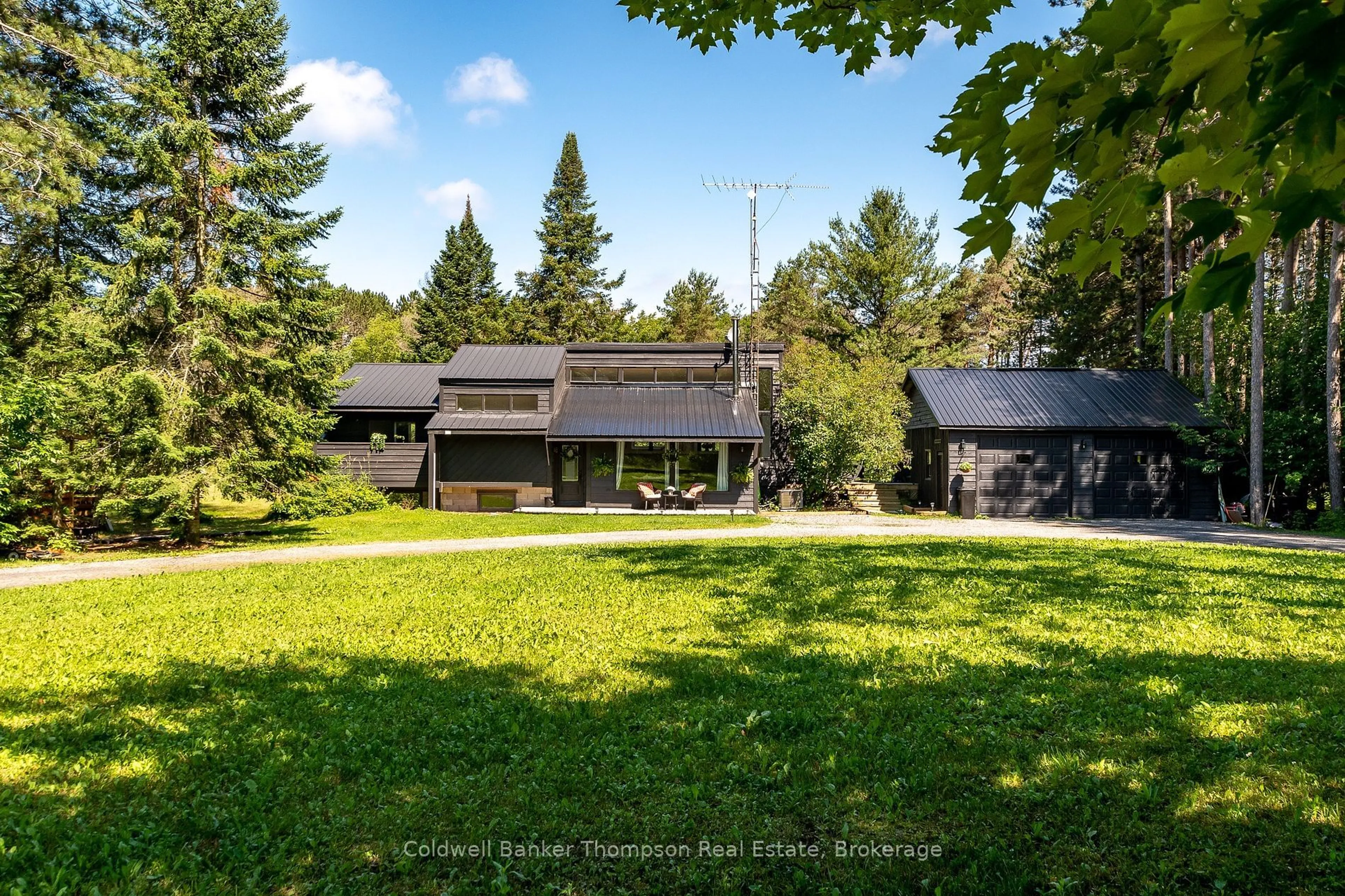 A pic from outside/outdoor area/front of a property/back of a property/a pic from drone, unknown for 1049 Lawrence Pit Rd, Muskoka Lakes Ontario P0B 1M0