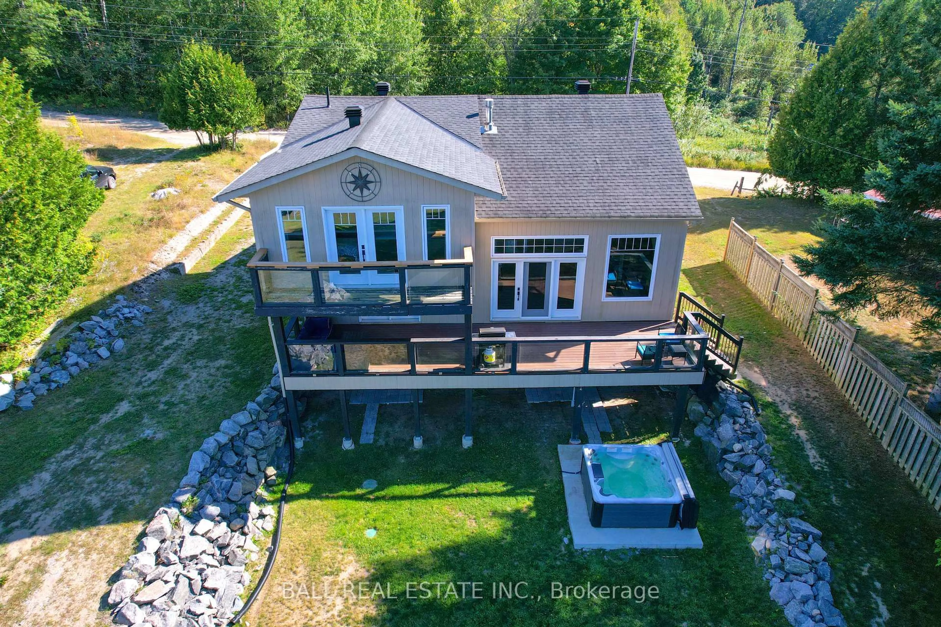 A pic from outside/outdoor area/front of a property/back of a property/a pic from drone, water/lake/river/ocean view for 113 Marina Rd, Hastings Highlands Ontario K0L 2H0