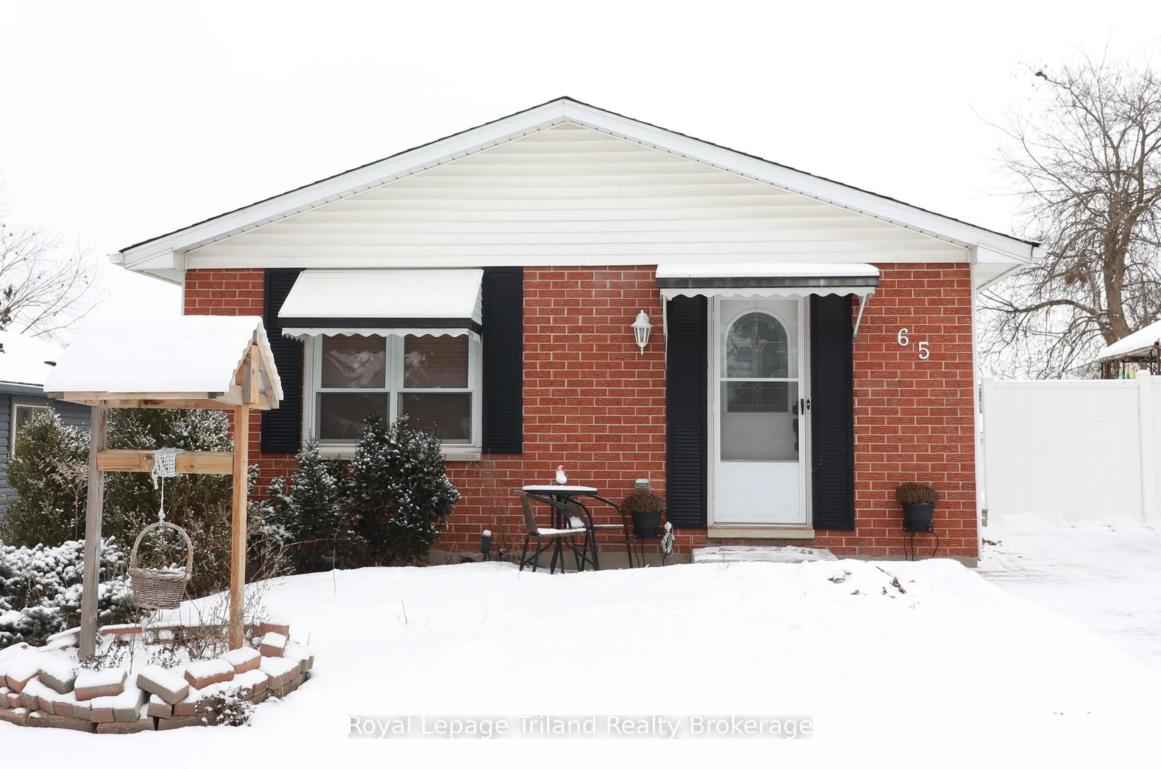 Home with brick exterior material, street for 65 Keats Dr, Woodstock Ontario N4S 8B9