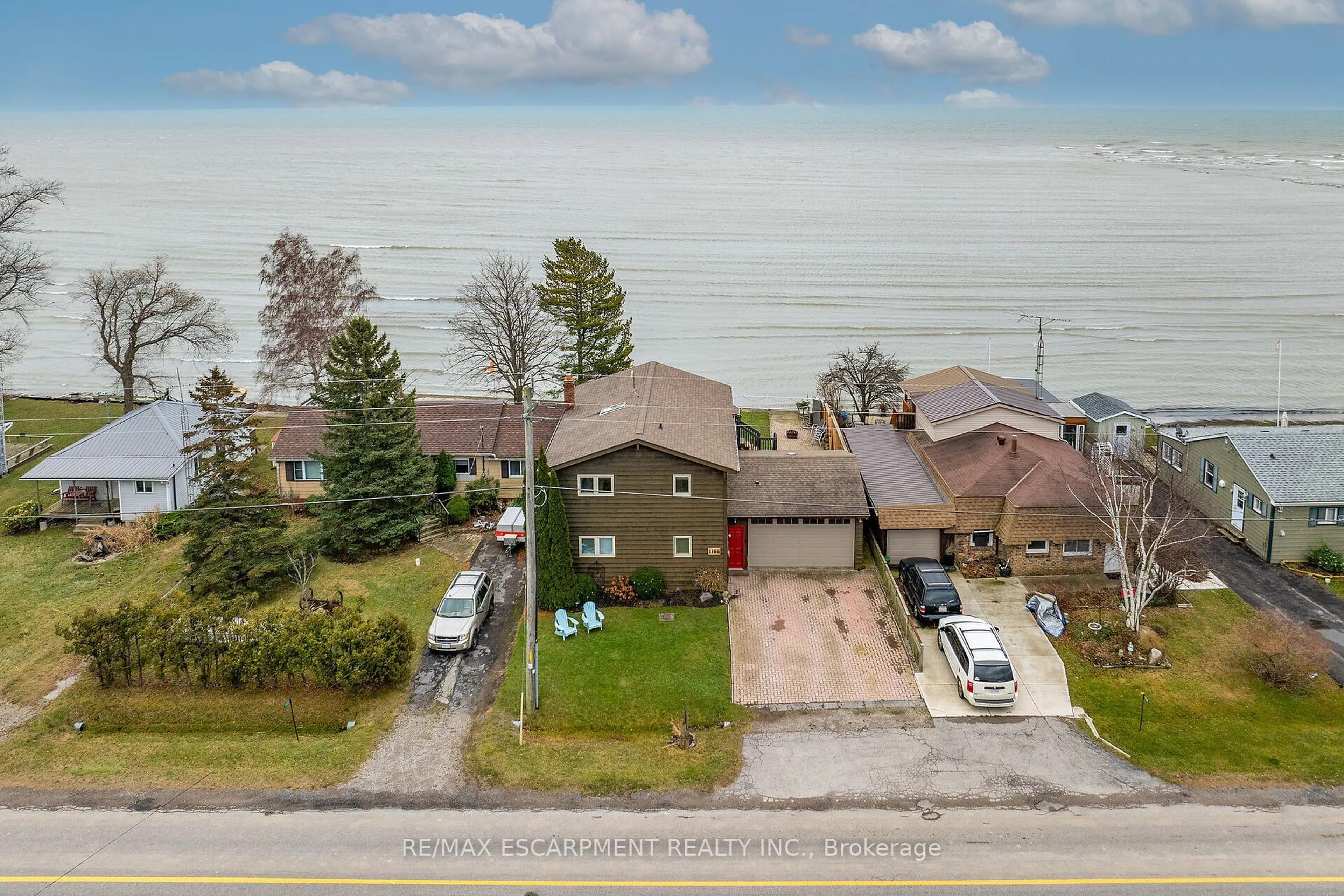 A pic from outside/outdoor area/front of a property/back of a property/a pic from drone, water/lake/river/ocean view for 1166 Lakeshore Rd, Haldimand Ontario N0A 1P0