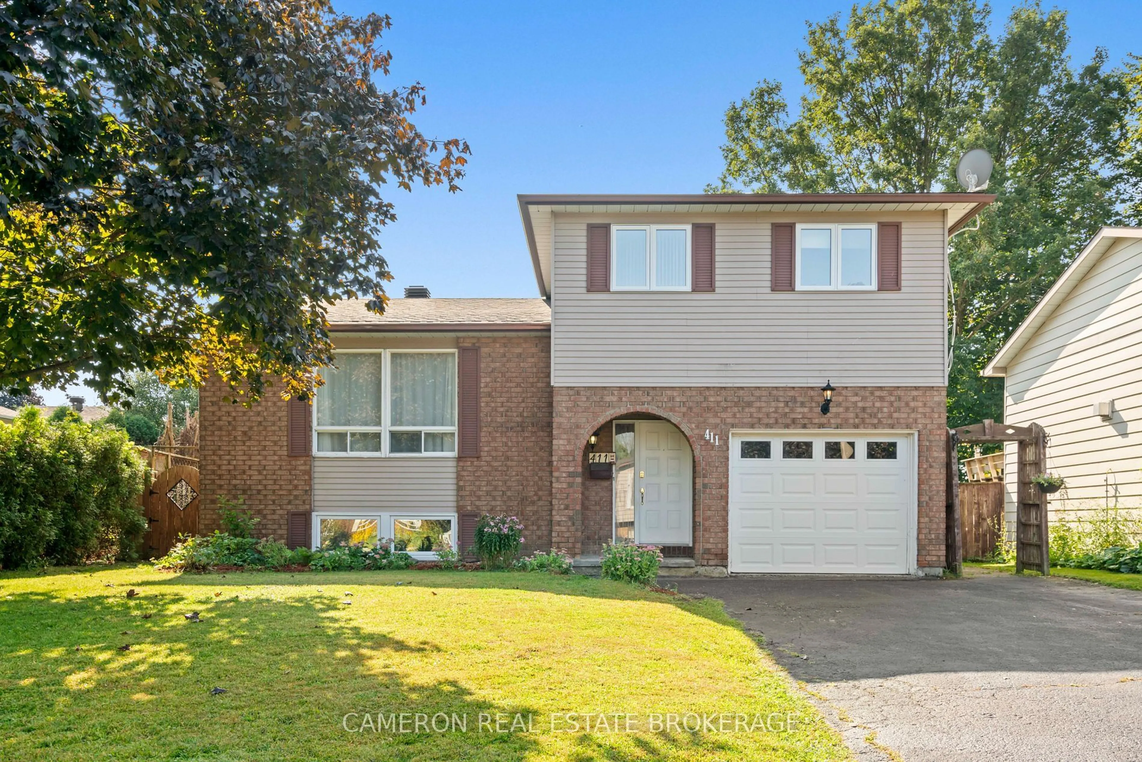 Home with brick exterior material, street for 411 Meadowvale Cres, Cornwall Ontario K6J 5M7