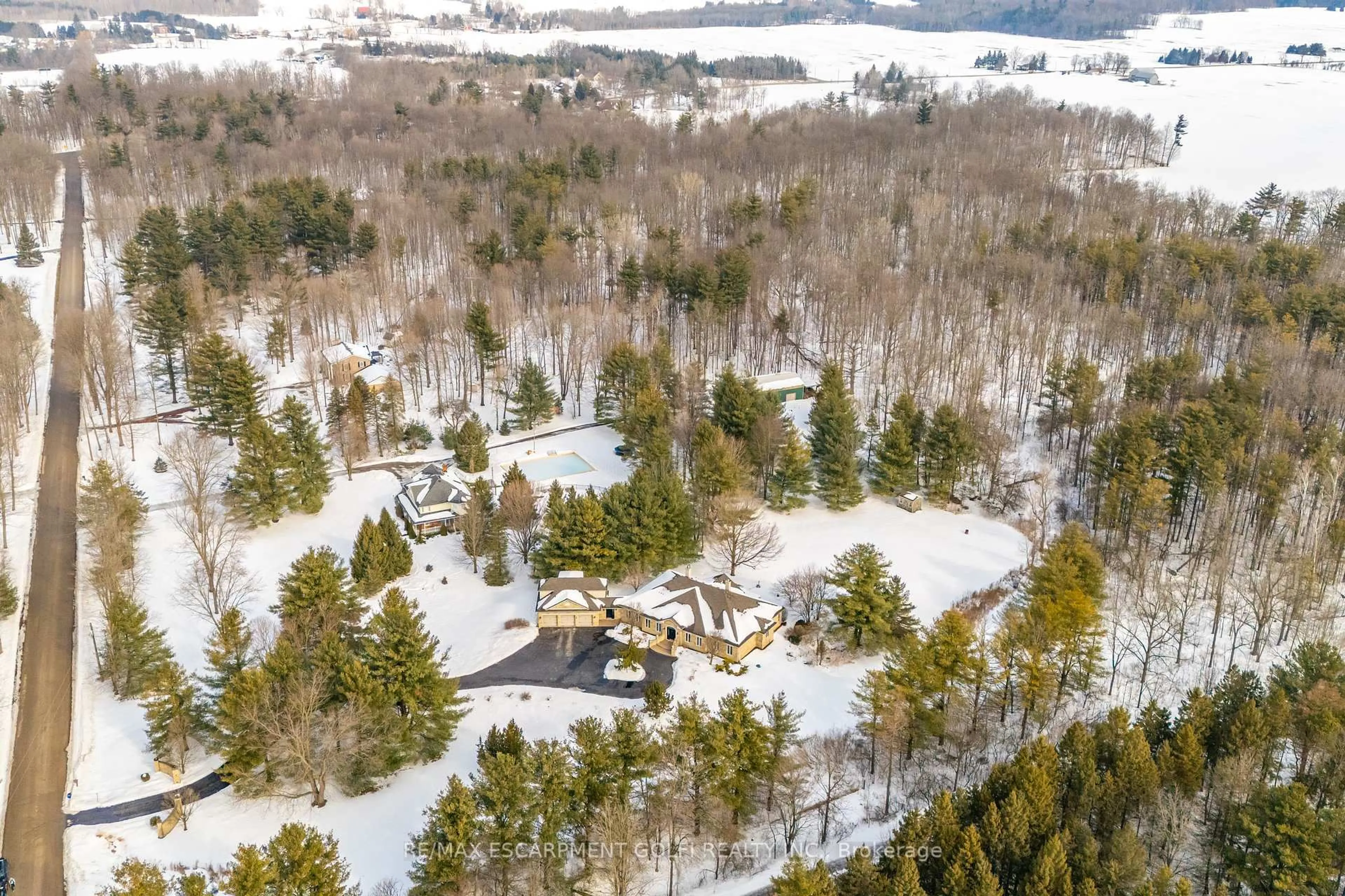 A pic from outside/outdoor area/front of a property/back of a property/a pic from drone, forest/trees view for 53 RANCH Rd, Brant Ontario N3T 5M1