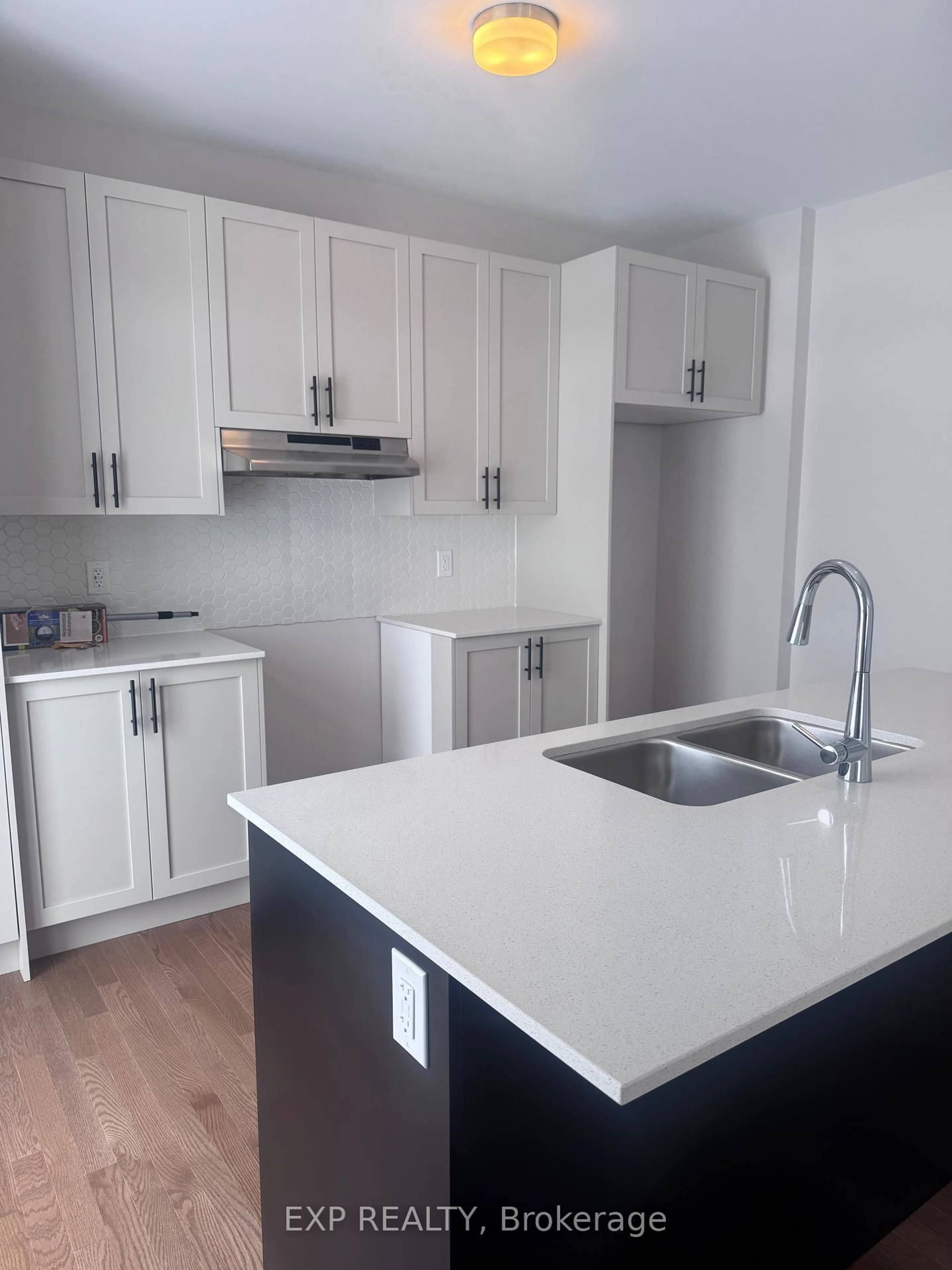 Open concept kitchen, wood/laminate floor for 170 Conservancy Dr, Barrhaven Ontario K2J 7L8