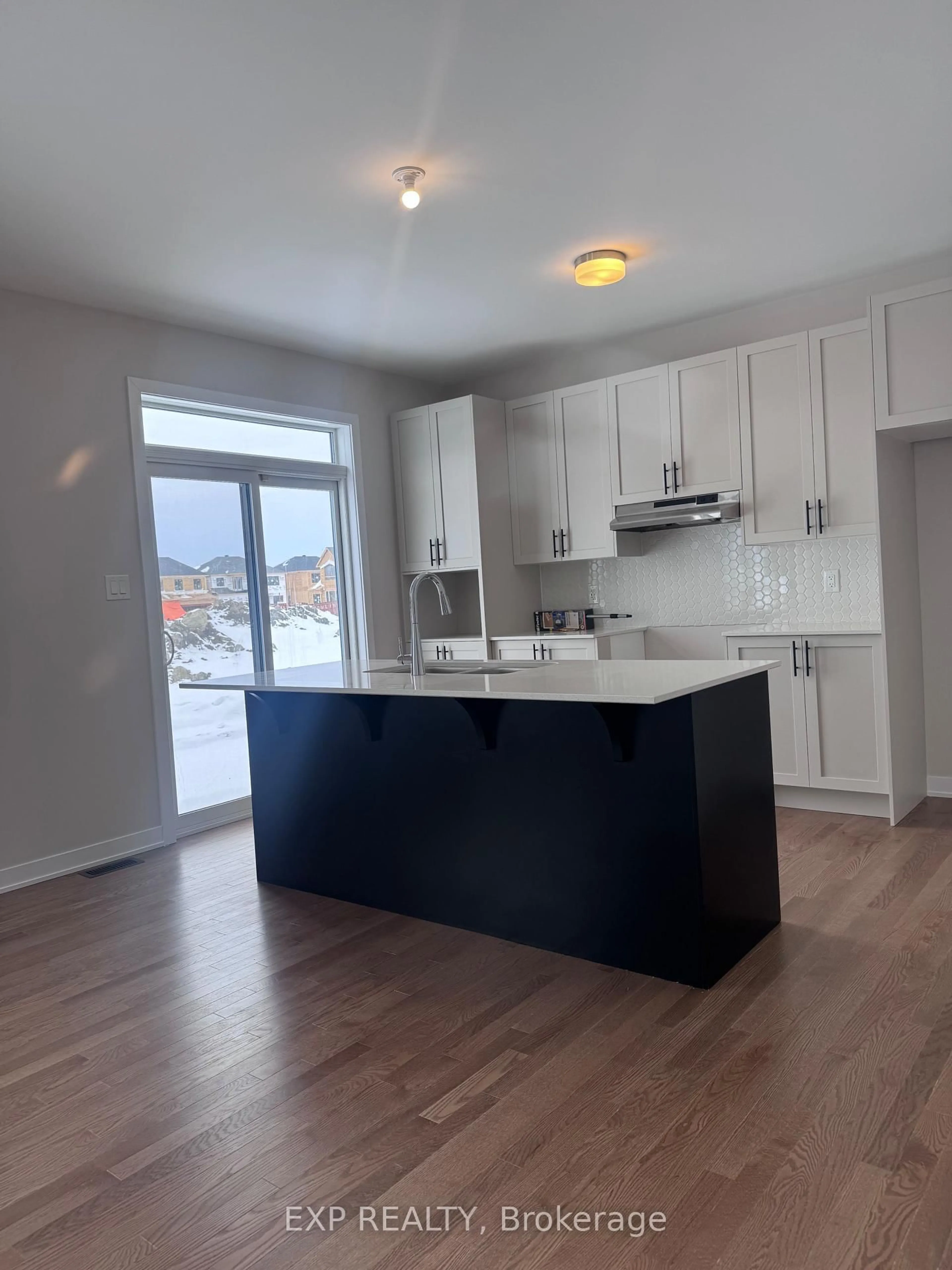 Open concept kitchen, wood/laminate floor for 170 Conservancy Dr, Barrhaven Ontario K2J 7L8