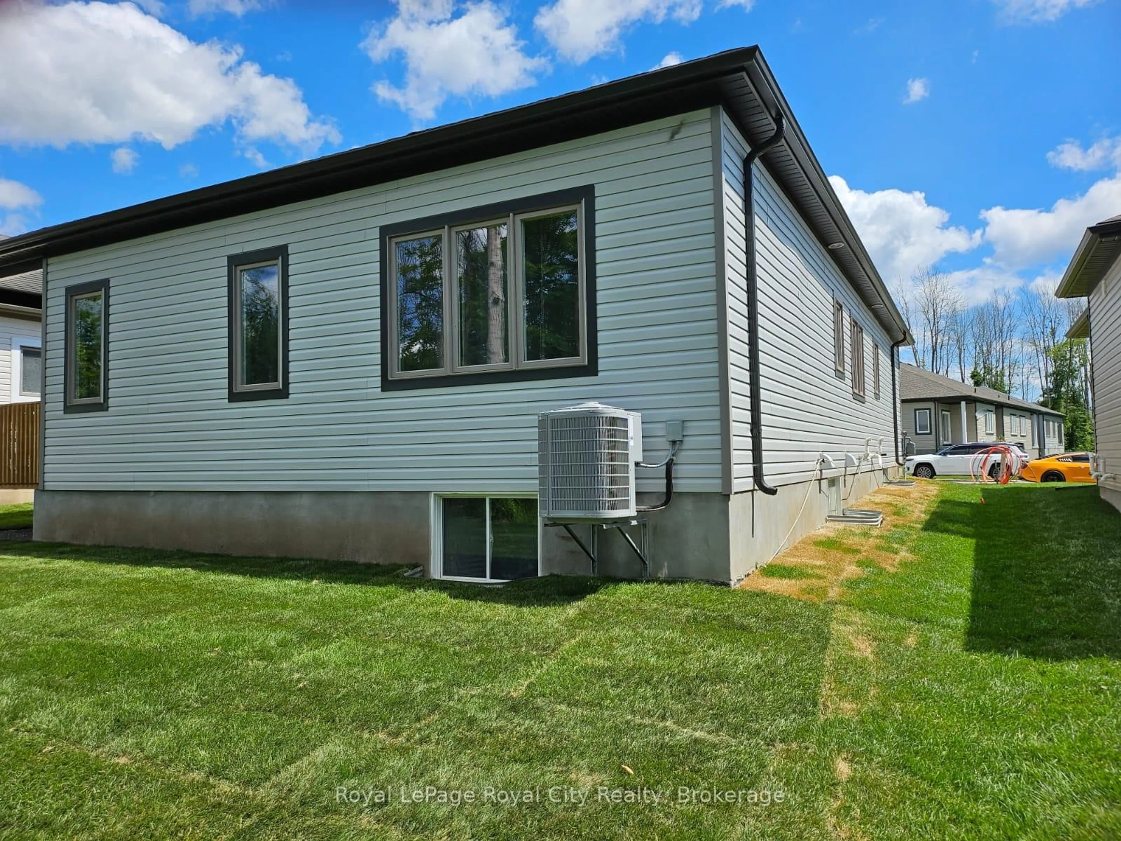 Home with vinyl exterior material, street for 266 Adley Dr, Brockville Ontario K6V 7J2