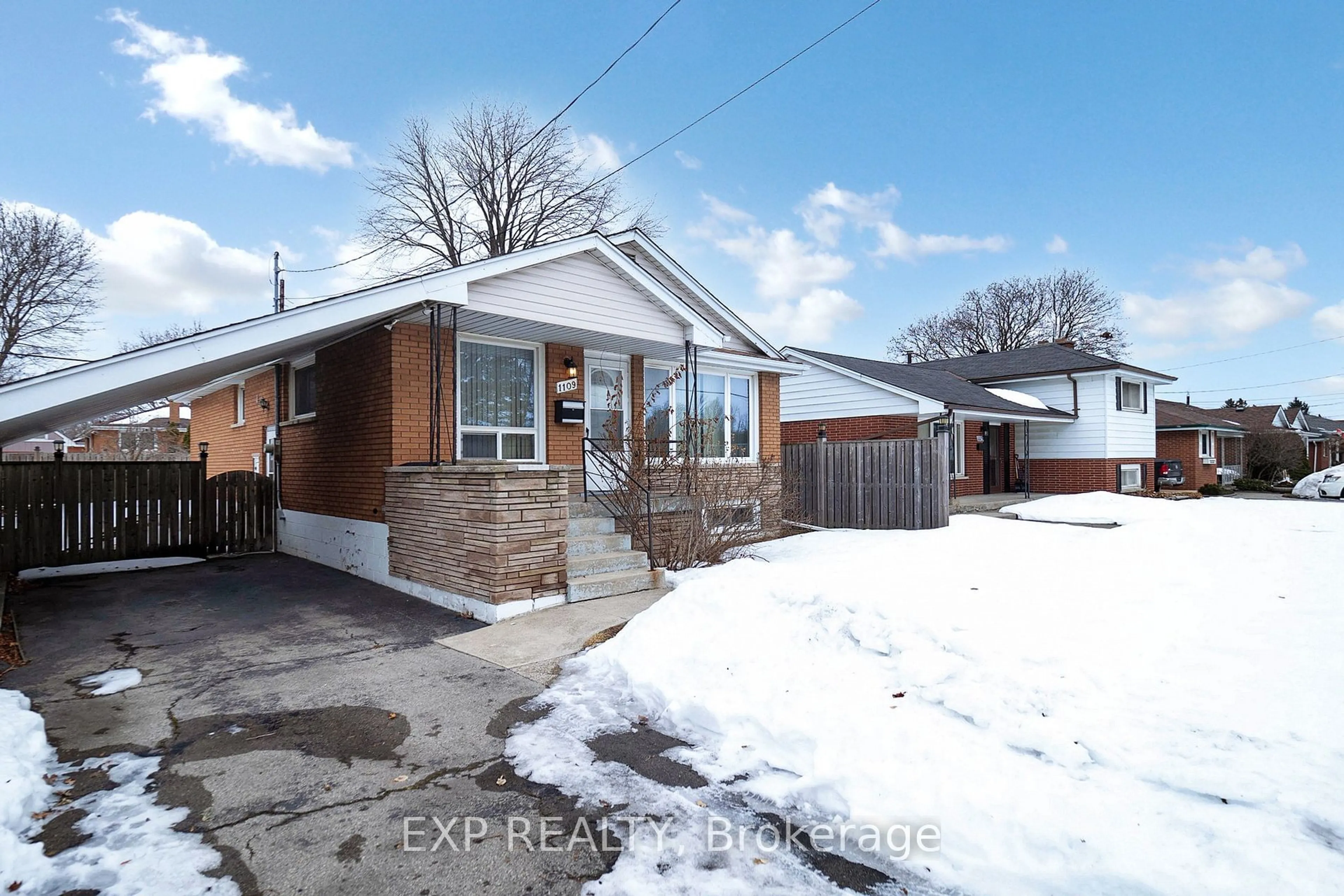 Home with brick exterior material, street for 1109 Mohawk Rd, Hamilton Ontario L8T 2S4