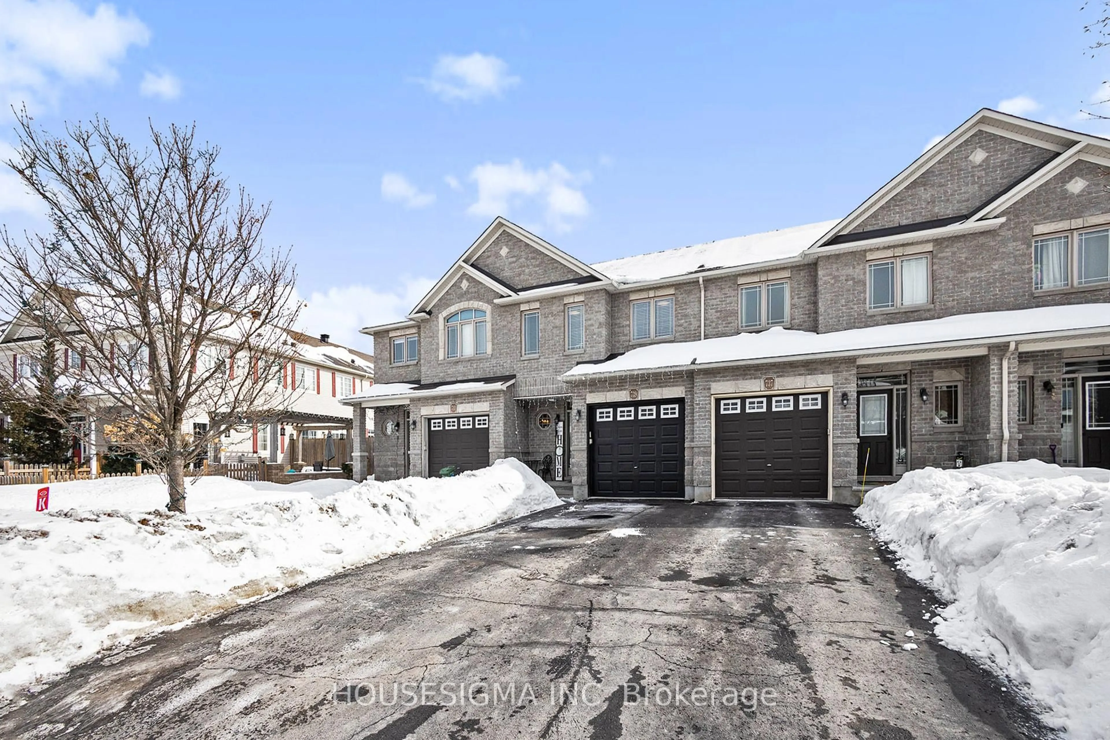 A pic from outside/outdoor area/front of a property/back of a property/a pic from drone, street for 739 Regiment Ave, Kanata Ontario K2M 0E6