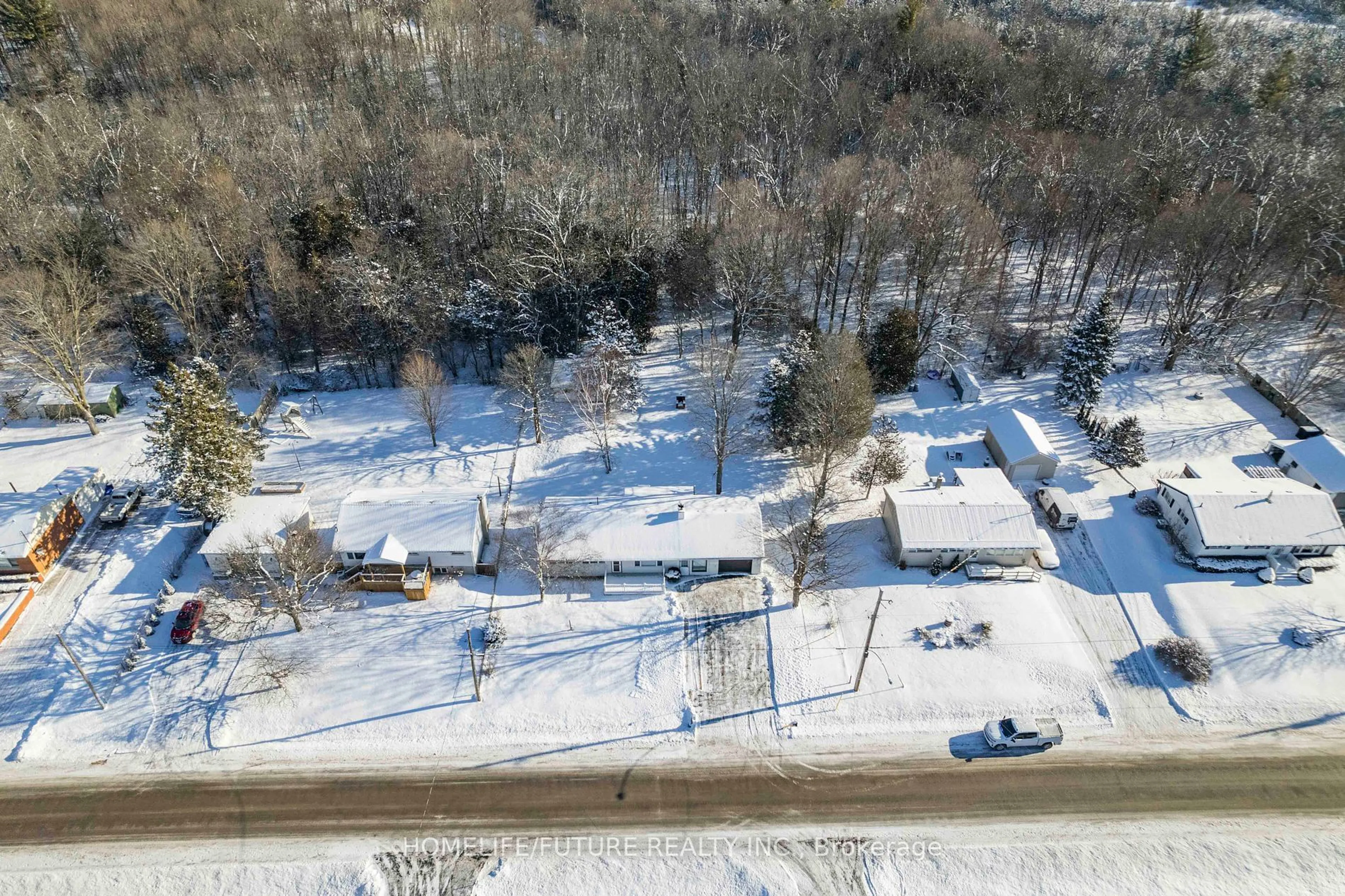 A pic from outside/outdoor area/front of a property/back of a property/a pic from drone, forest/trees view for 85 Peterson St, Quinte West Ontario K8V 5P8