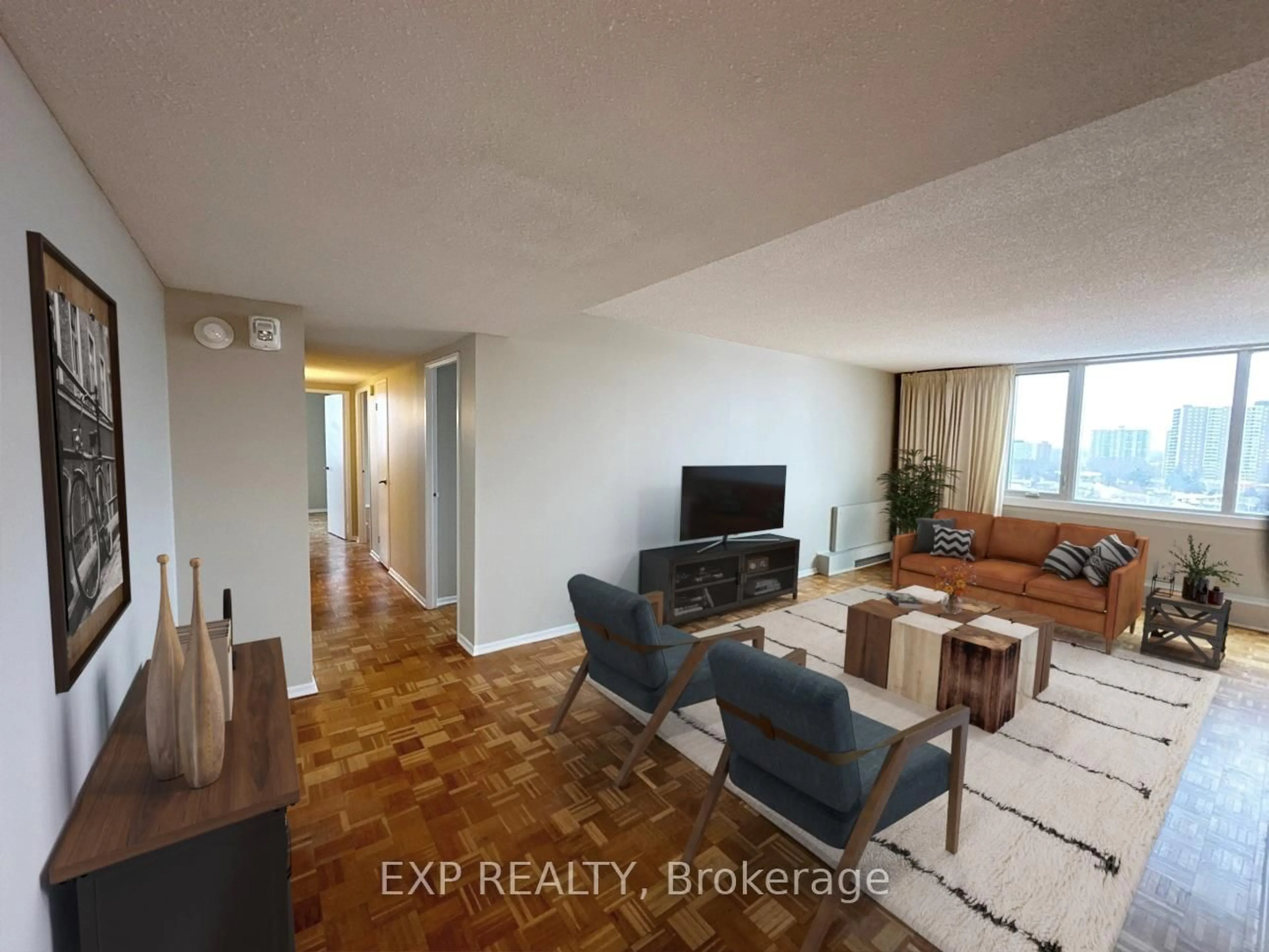 Living room with furniture, wood/laminate floor for 2625 Regina St #1001, Britannia - Lincoln Heights and Area Ontario K2B 5W8