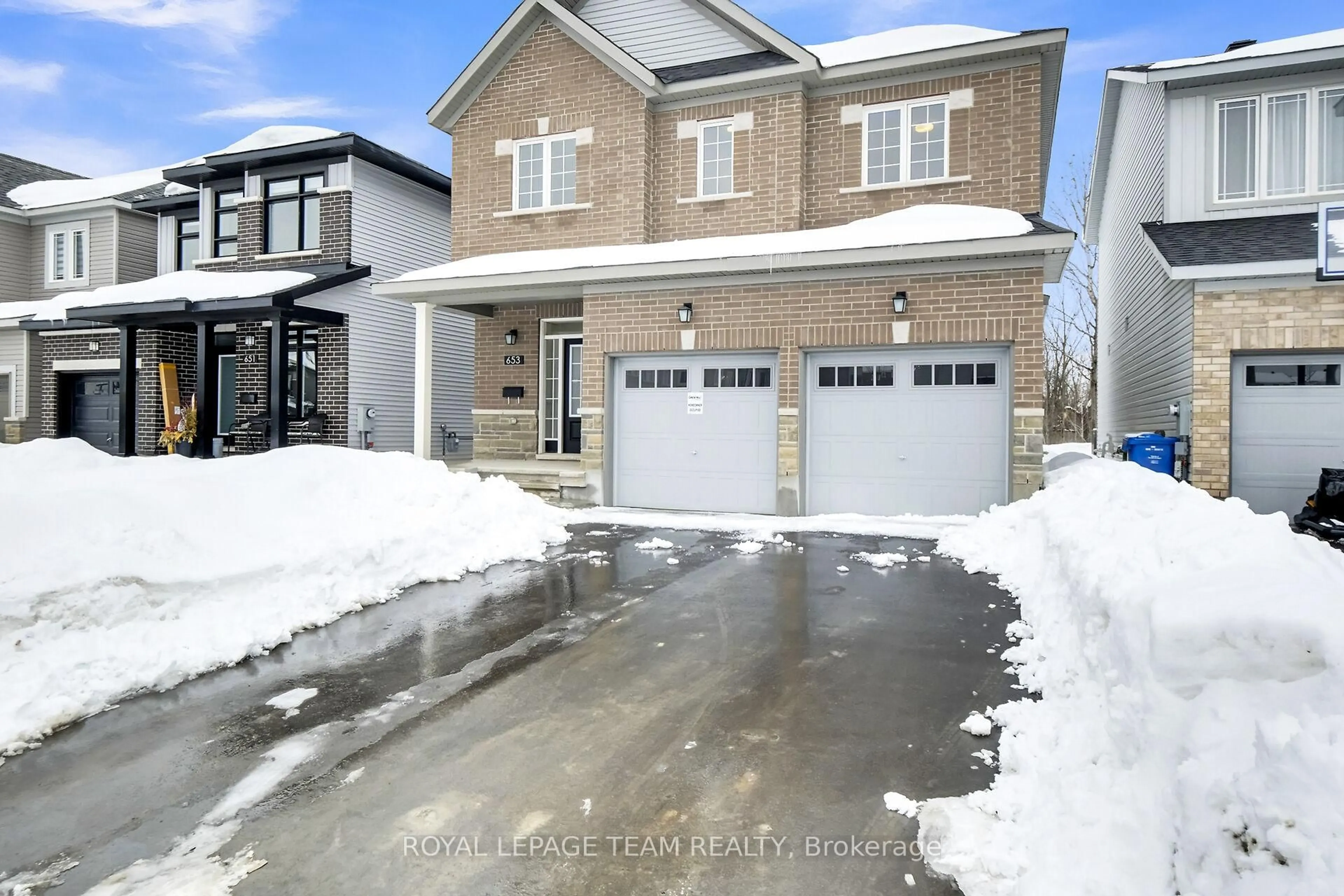 Home with brick exterior material, street for 653 Persimmon Way, Orleans - Convent Glen and Area Ontario K1W 0T3