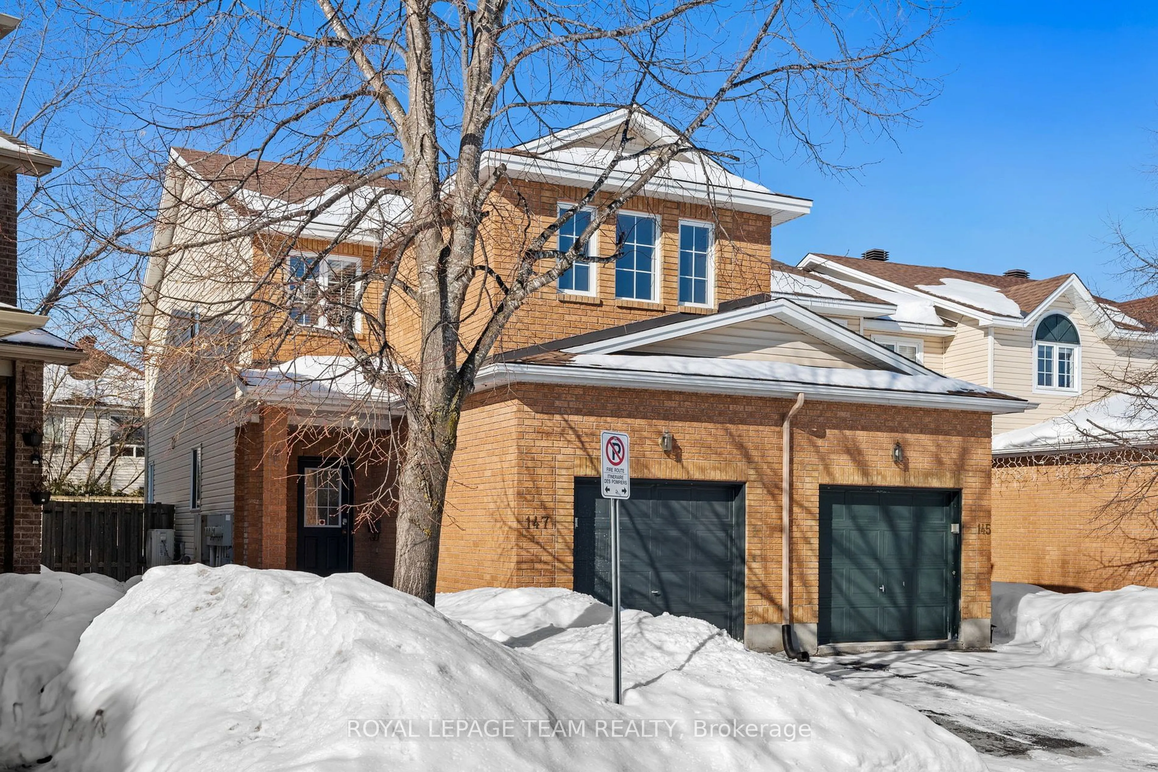 Home with brick exterior material, street for 147 Kinross Private, Kanata Ontario K2K 3P9