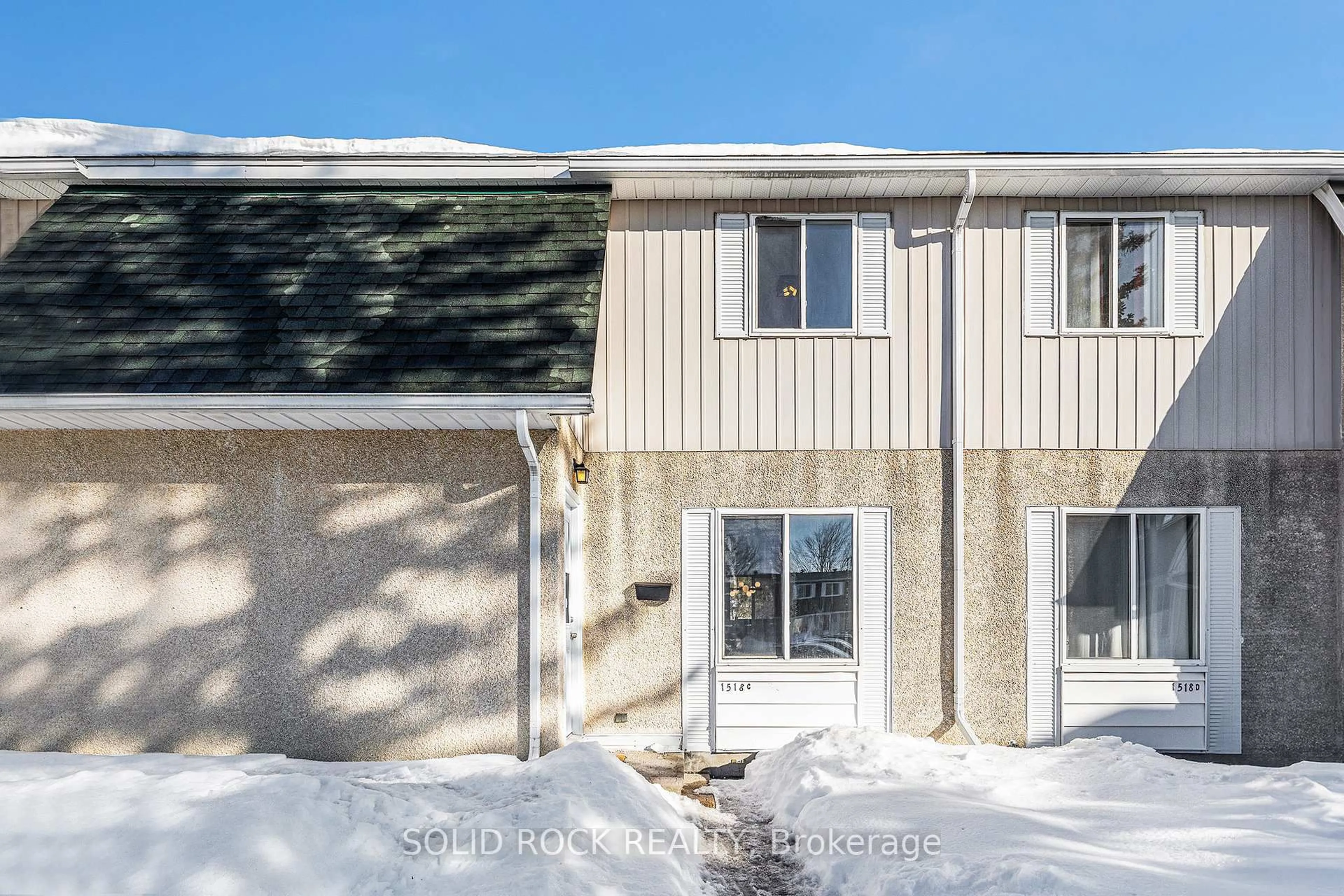 A pic from outside/outdoor area/front of a property/back of a property/a pic from drone, street for 1518C Beaverpond Dr #31, Cyrville - Carson Grove - Pineview Ontario K1B 3R9