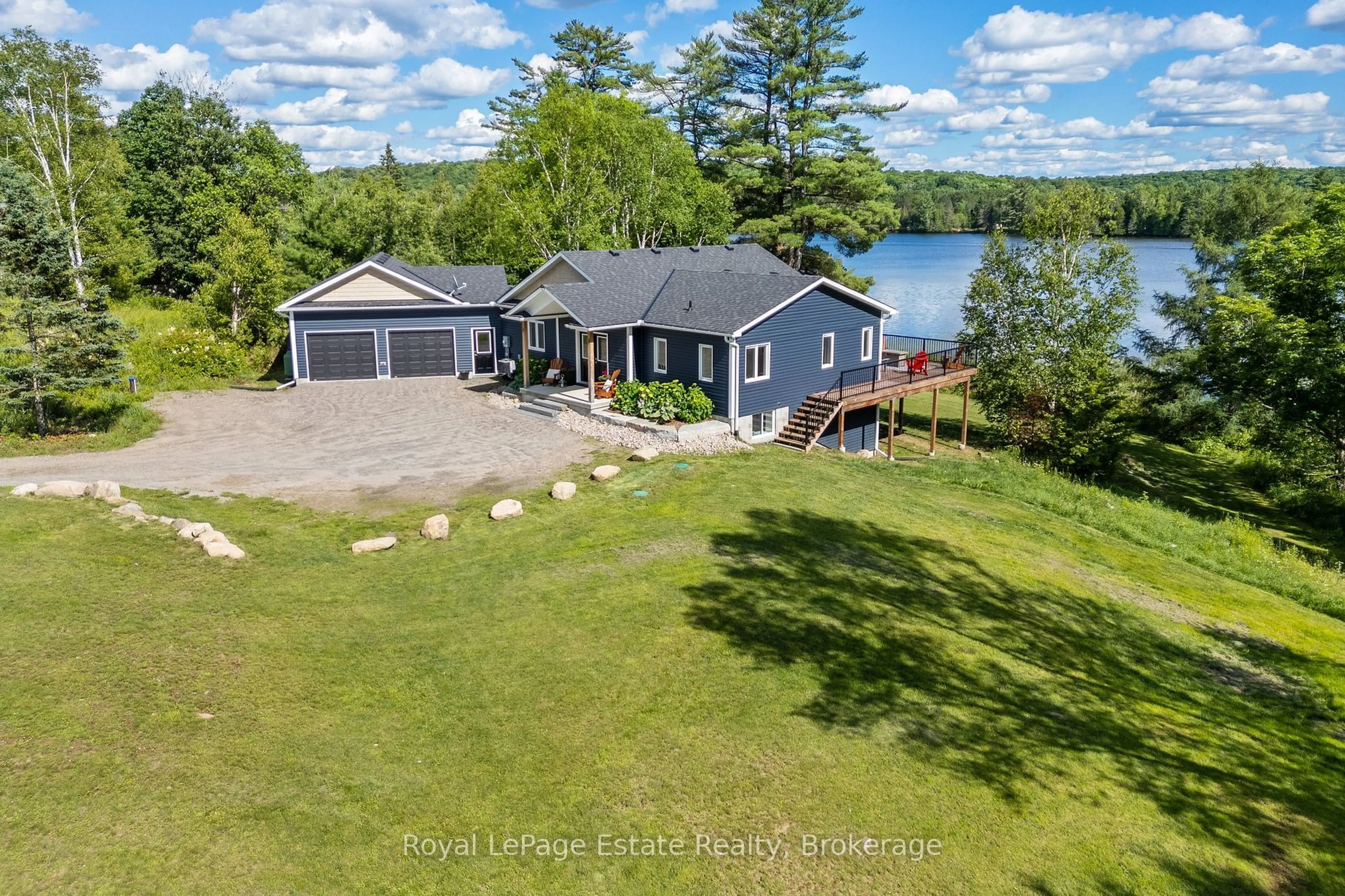 A pic from outside/outdoor area/front of a property/back of a property/a pic from drone, water/lake/river/ocean view for 4318 Glamorgan Rd, Dysart et al Ontario K0M 1S0