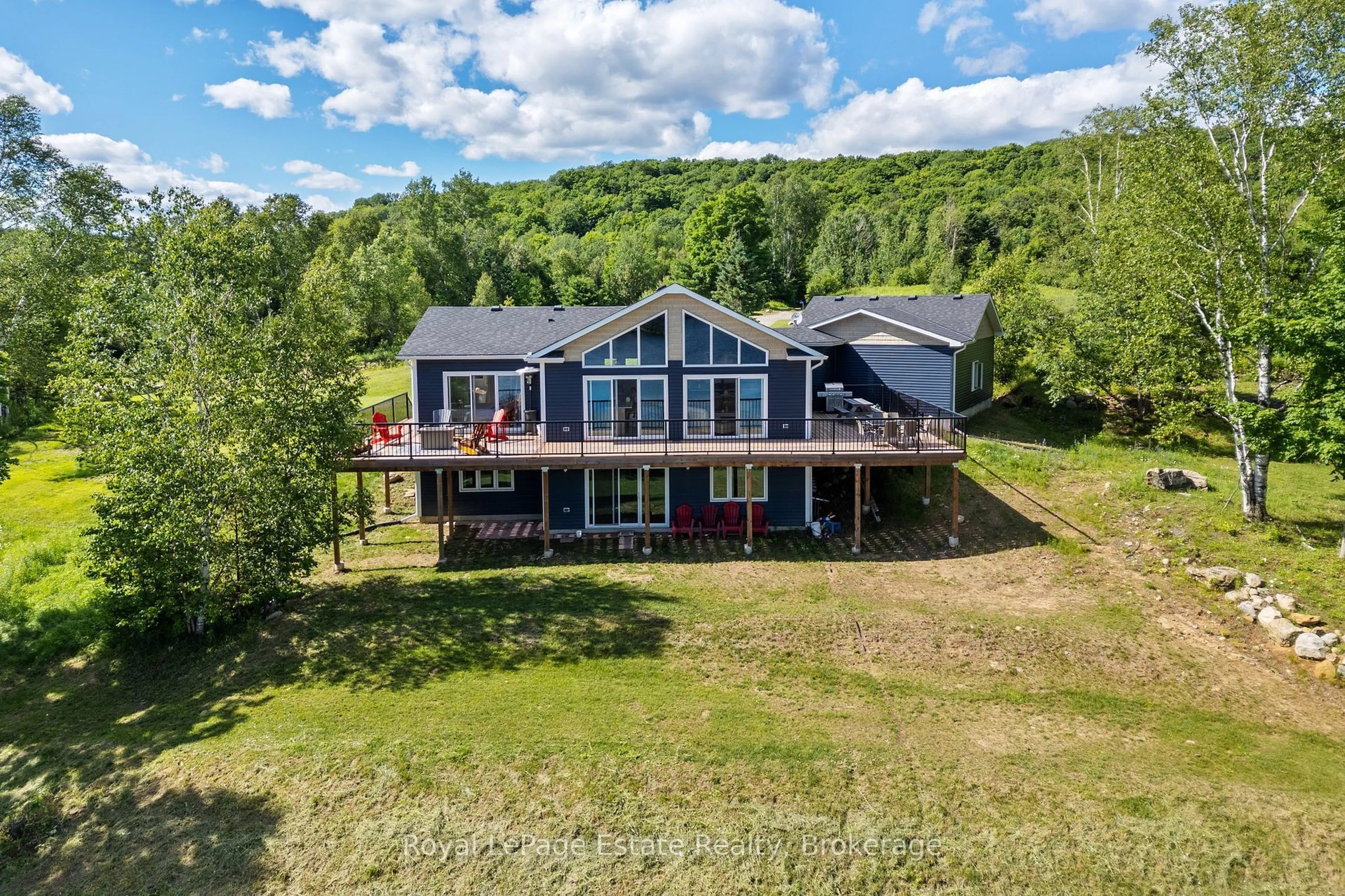 A pic from outside/outdoor area/front of a property/back of a property/a pic from drone, water/lake/river/ocean view for 4318 Glamorgan Rd, Dysart et al Ontario K0M 1S0