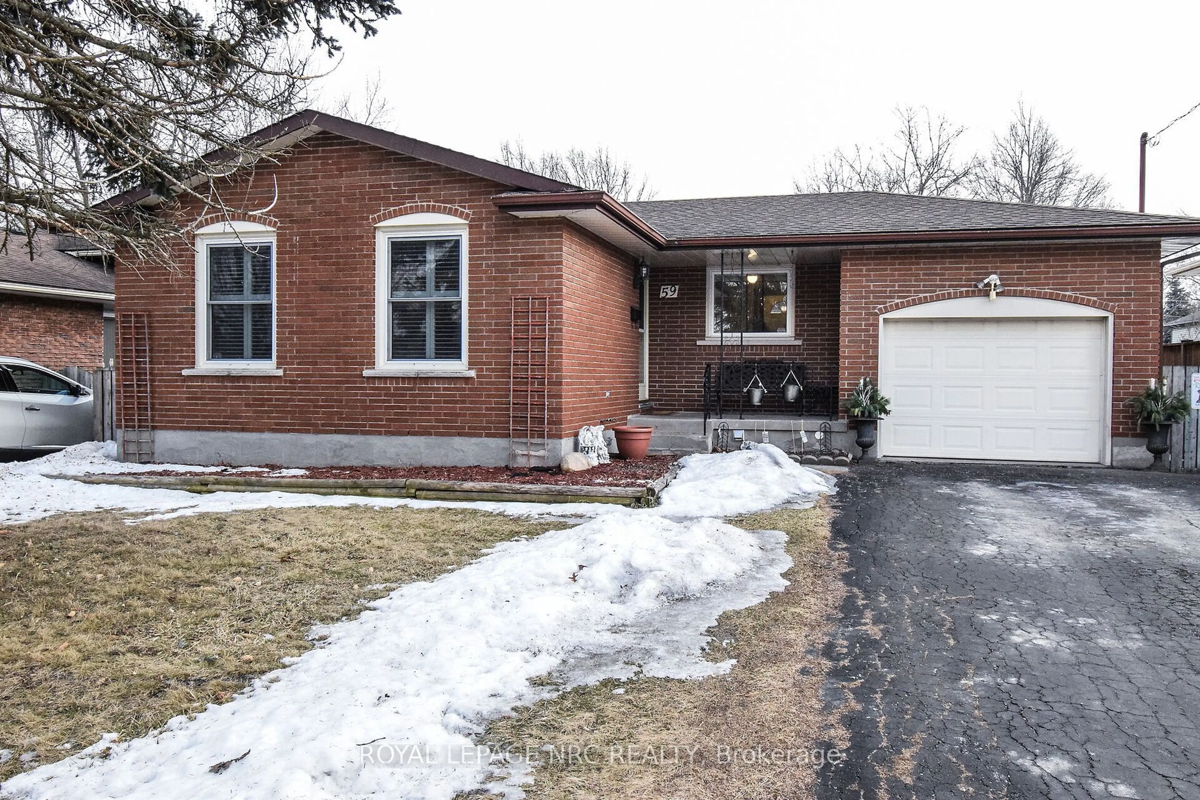 Home with brick exterior material, street for 59 Acadia Cres, St. Catharines Ontario L2P 1H7