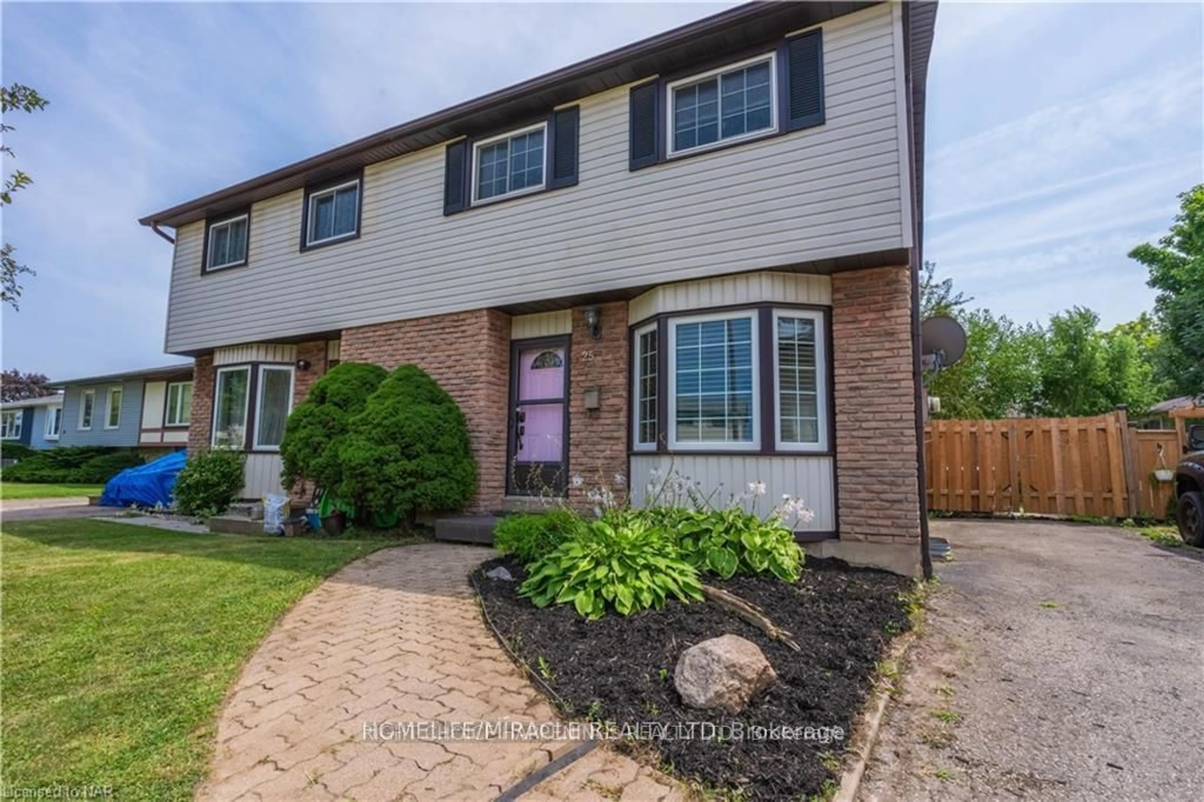 Home with brick exterior material, street for 25 Arran Dr, St. Catharines Ontario L2N 1L6