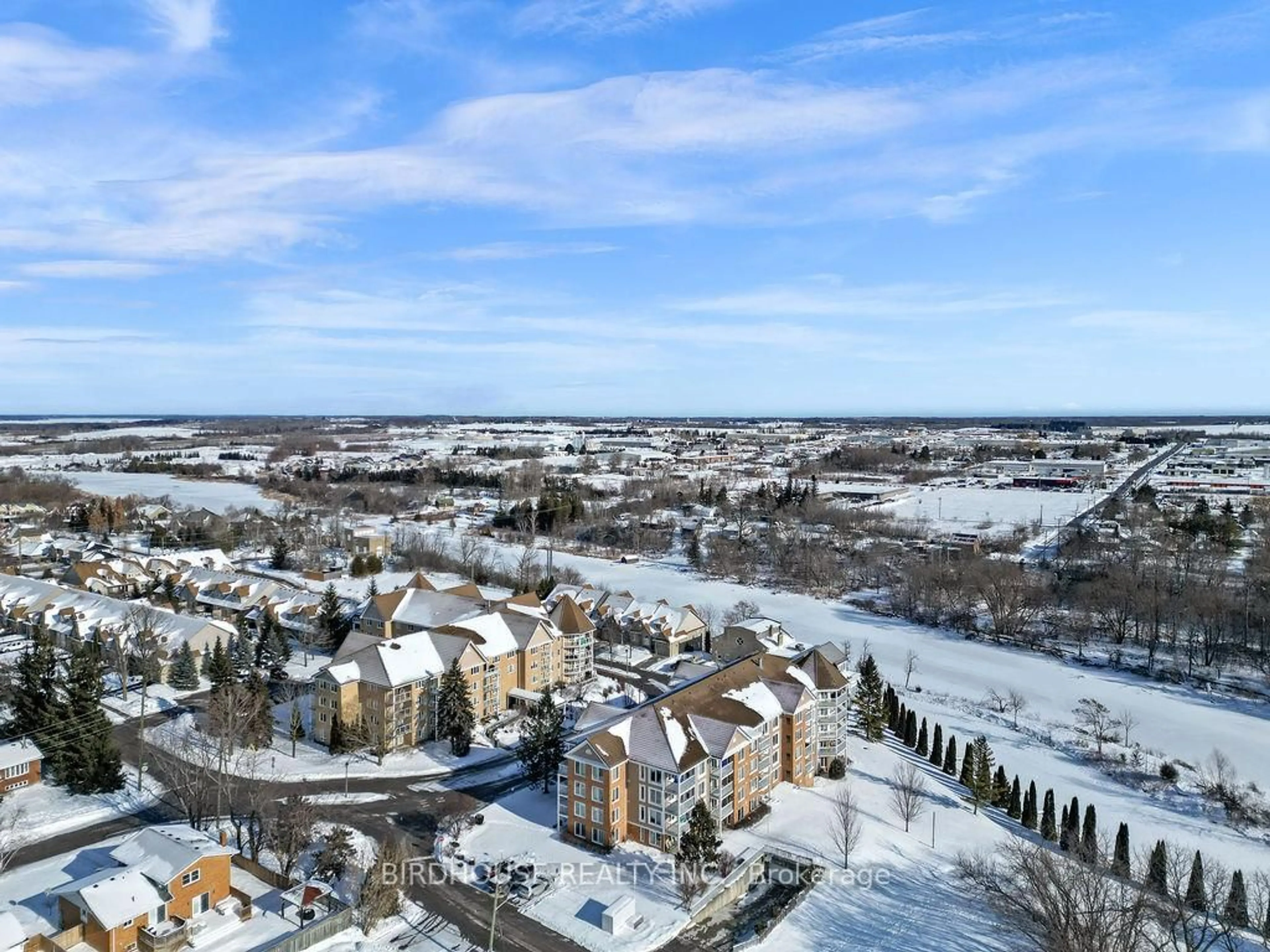 A pic from outside/outdoor area/front of a property/back of a property/a pic from drone, water/lake/river/ocean view for 50 Rivermill Blvd #204, Kawartha Lakes Ontario K9V 6C1