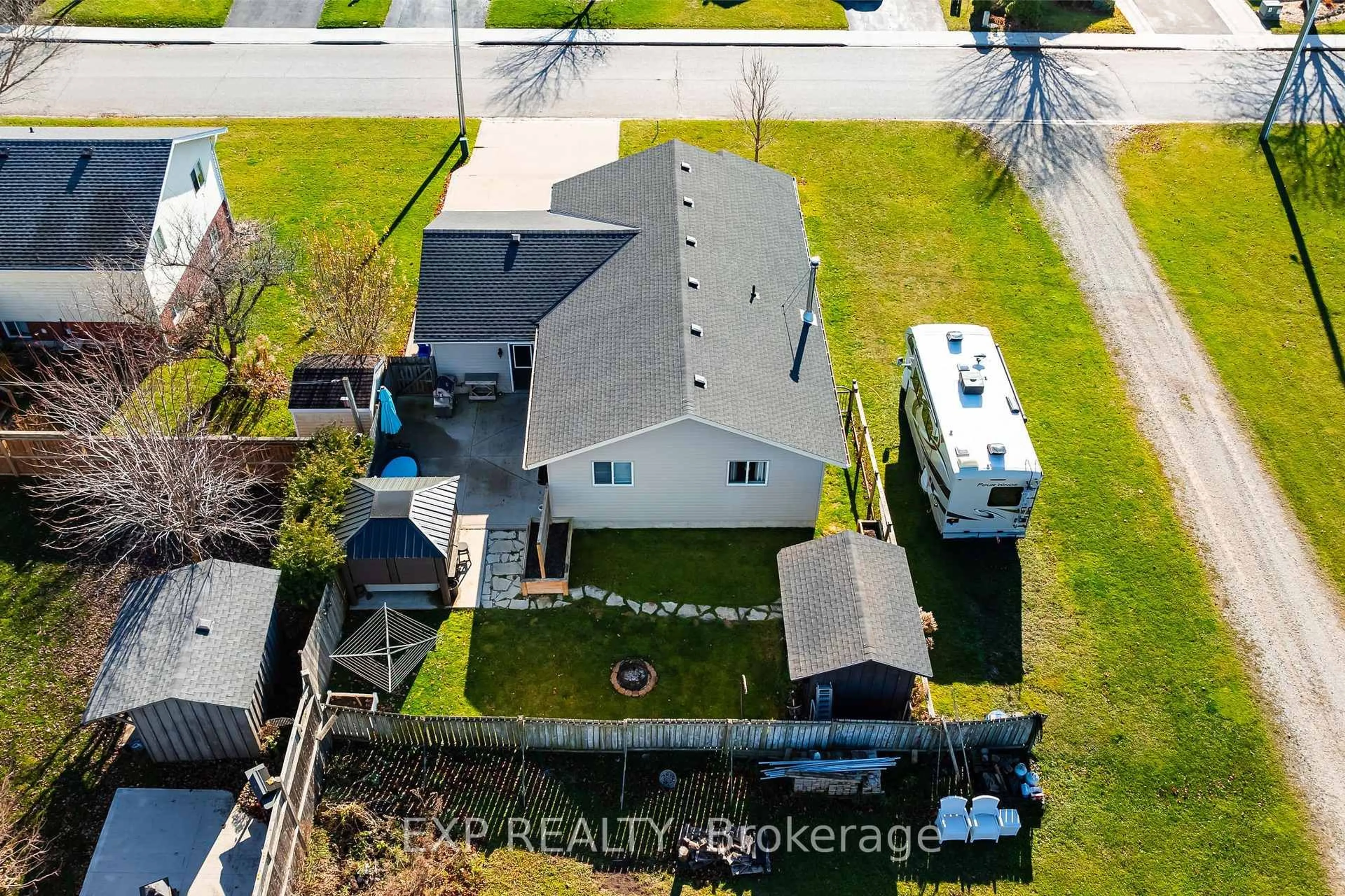 A pic from outside/outdoor area/front of a property/back of a property/a pic from drone, unknown for 771 Princess St, Wellington North Ontario N0G 2L3