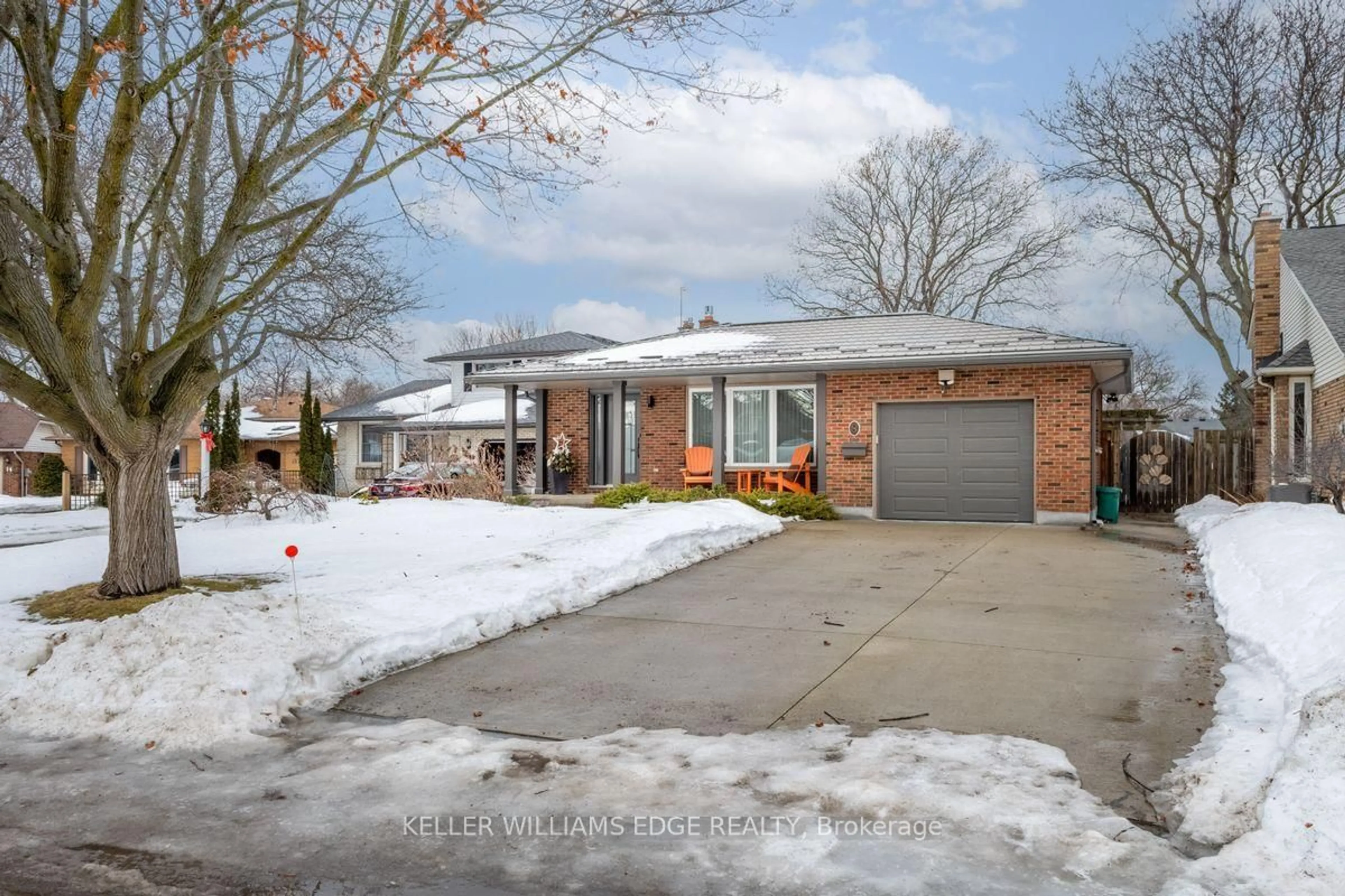 Home with brick exterior material, street for 8 Woodgarden Crt, St. Catharines Ontario L2M 7C9