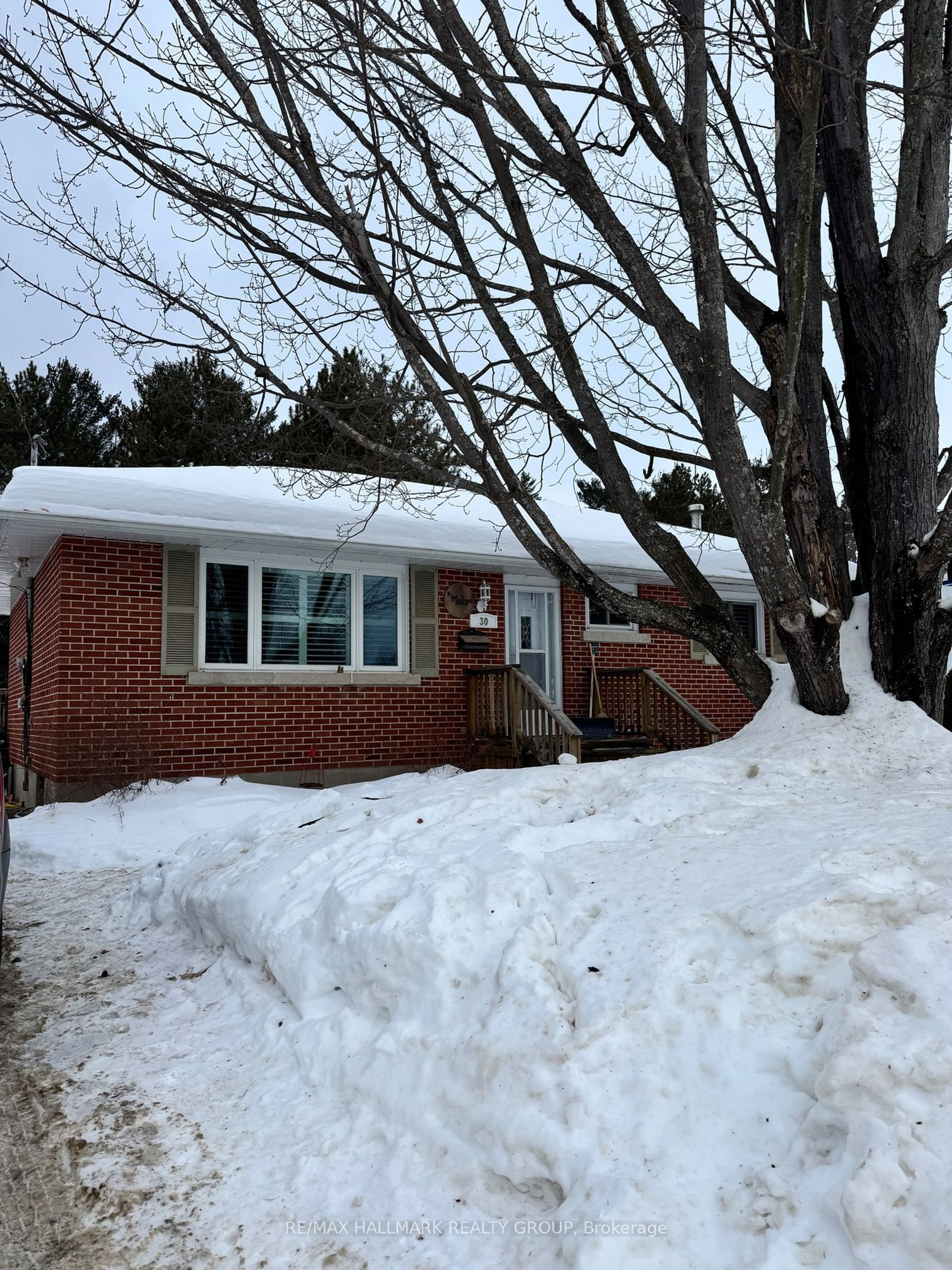 Home with brick exterior material, street for 30 Sunset Cres, Petawawa Ontario K8H 2L9