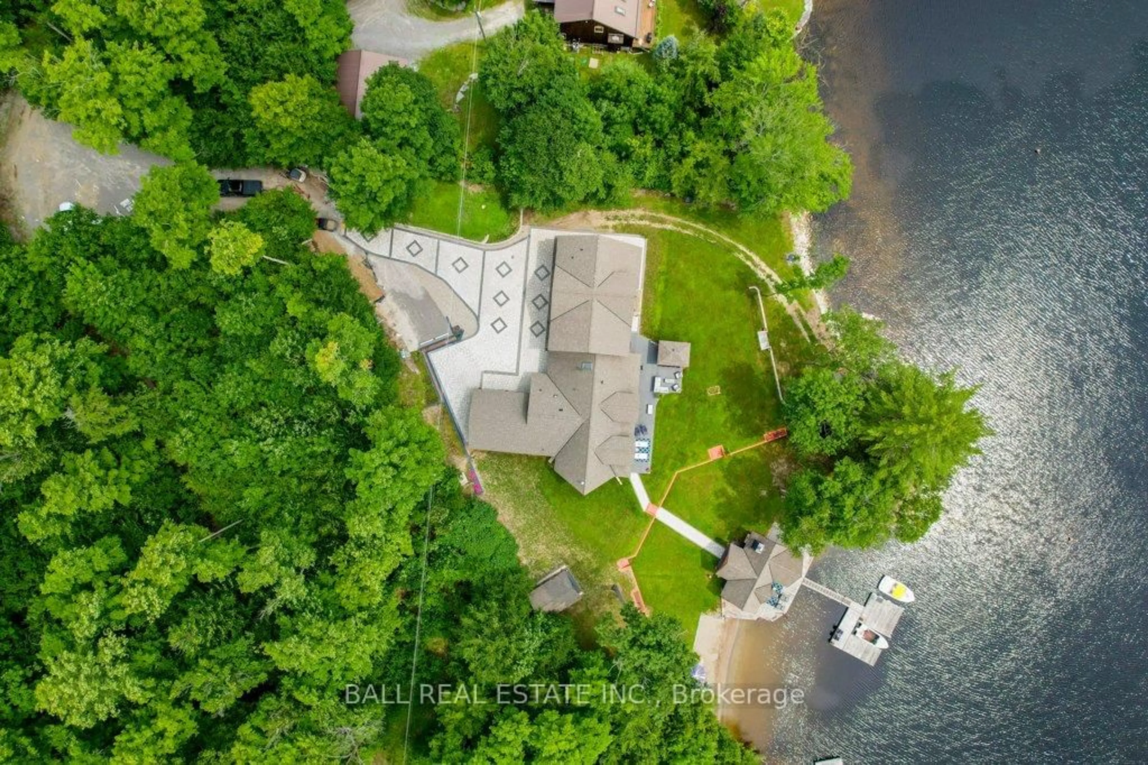 A pic from outside/outdoor area/front of a property/back of a property/a pic from drone, water/lake/river/ocean view for 33 Fire Route 210, Galway-Cavendish and Harvey Ontario K0L 1J0