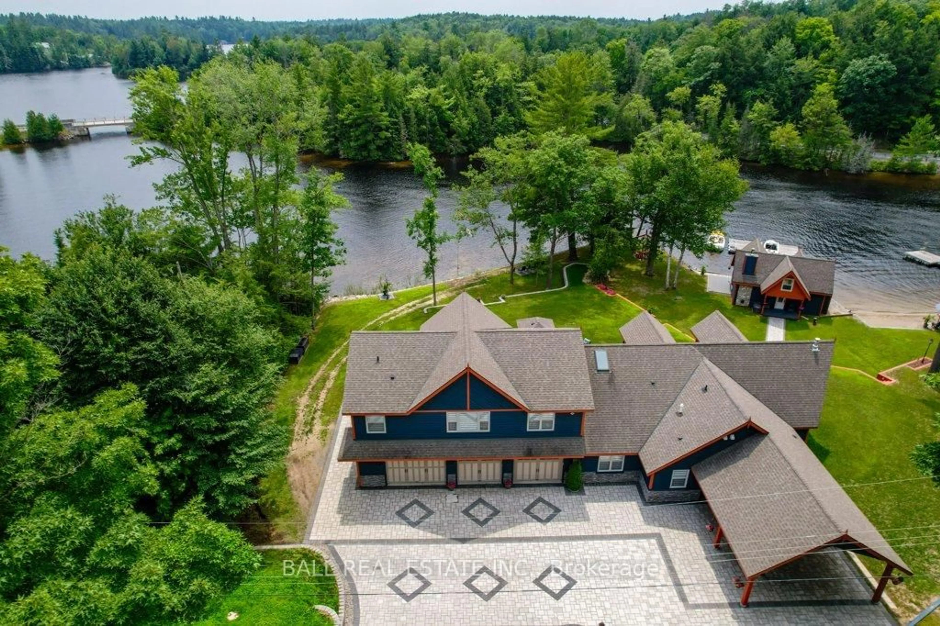 A pic from outside/outdoor area/front of a property/back of a property/a pic from drone, water/lake/river/ocean view for 33 Fire Route 210, Galway-Cavendish and Harvey Ontario K0L 1J0