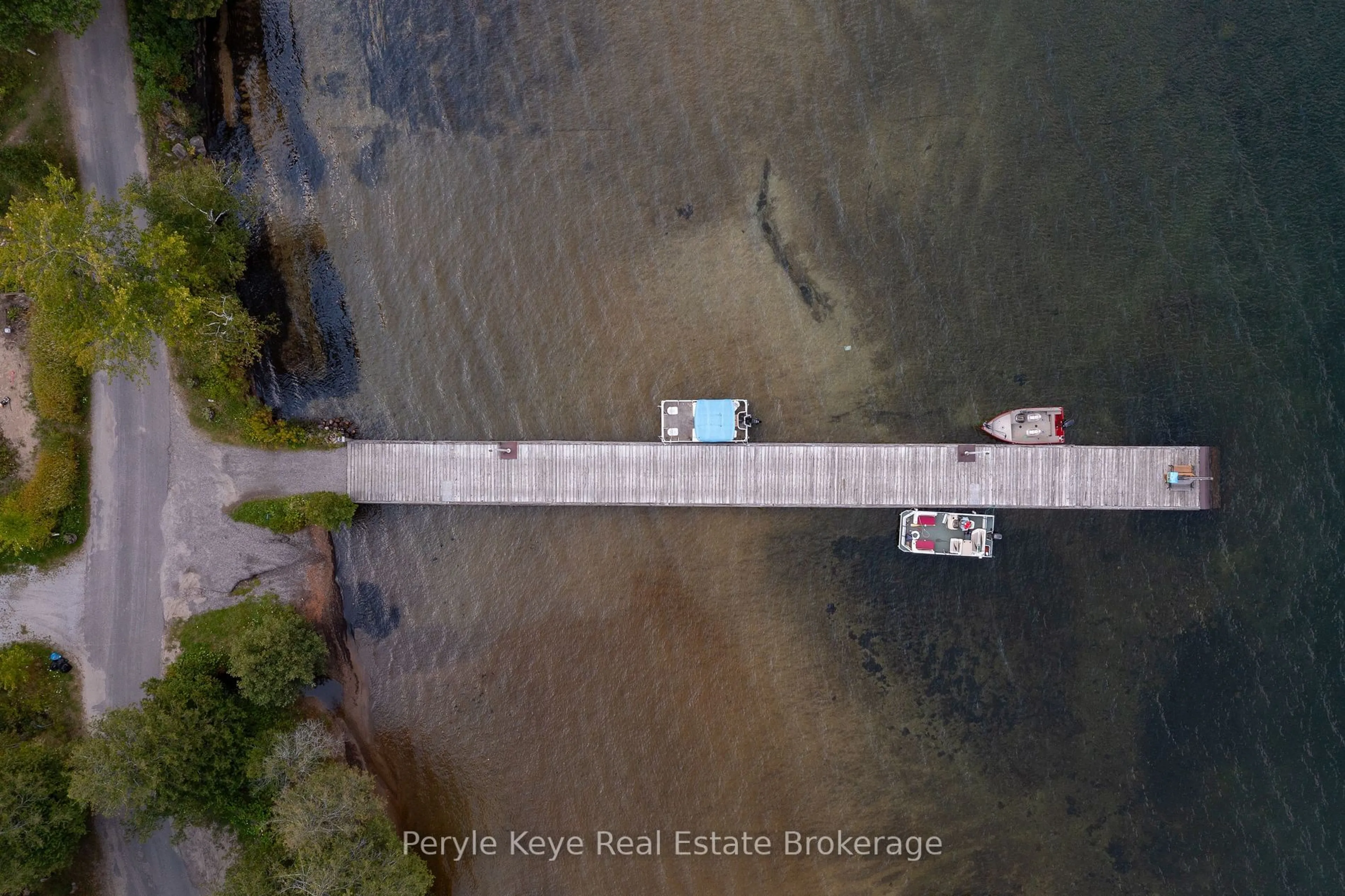 A pic from outside/outdoor area/front of a property/back of a property/a pic from drone, water/lake/river/ocean view for 1098 Lawrence Pit Rd, Muskoka Lakes Ontario P0B 1M0